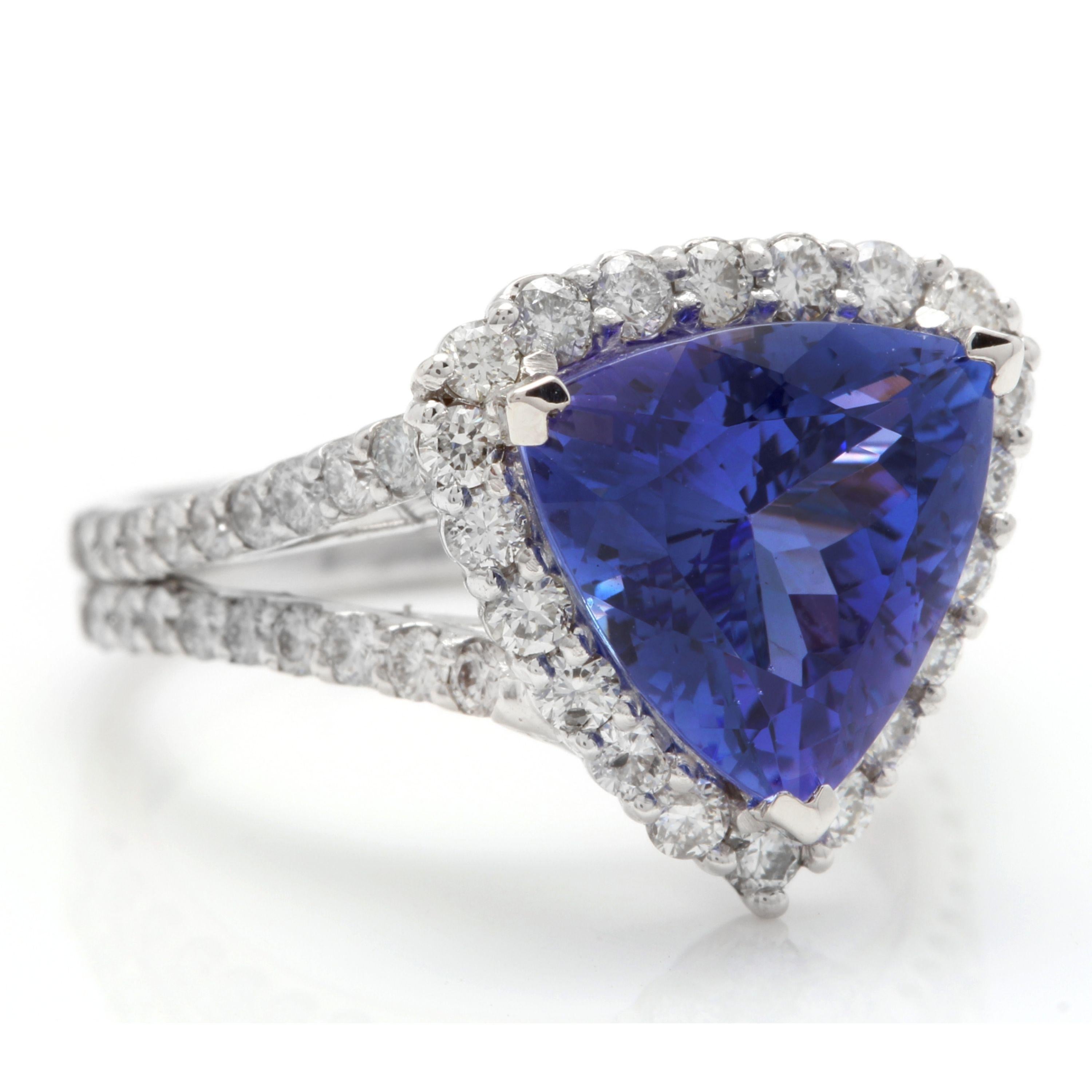 5.00 Carats Natural Very Nice Looking Tanzanite and Diamond 14K Solid White Gold Ring

Total Natural Trillion Cut Tanzanite Weight is: Approx. 4.00 Carats

Tanzanite Measures: Approx. 10.60 x 10.15mm

Natural Round Diamonds Weight: Approx. 1.00