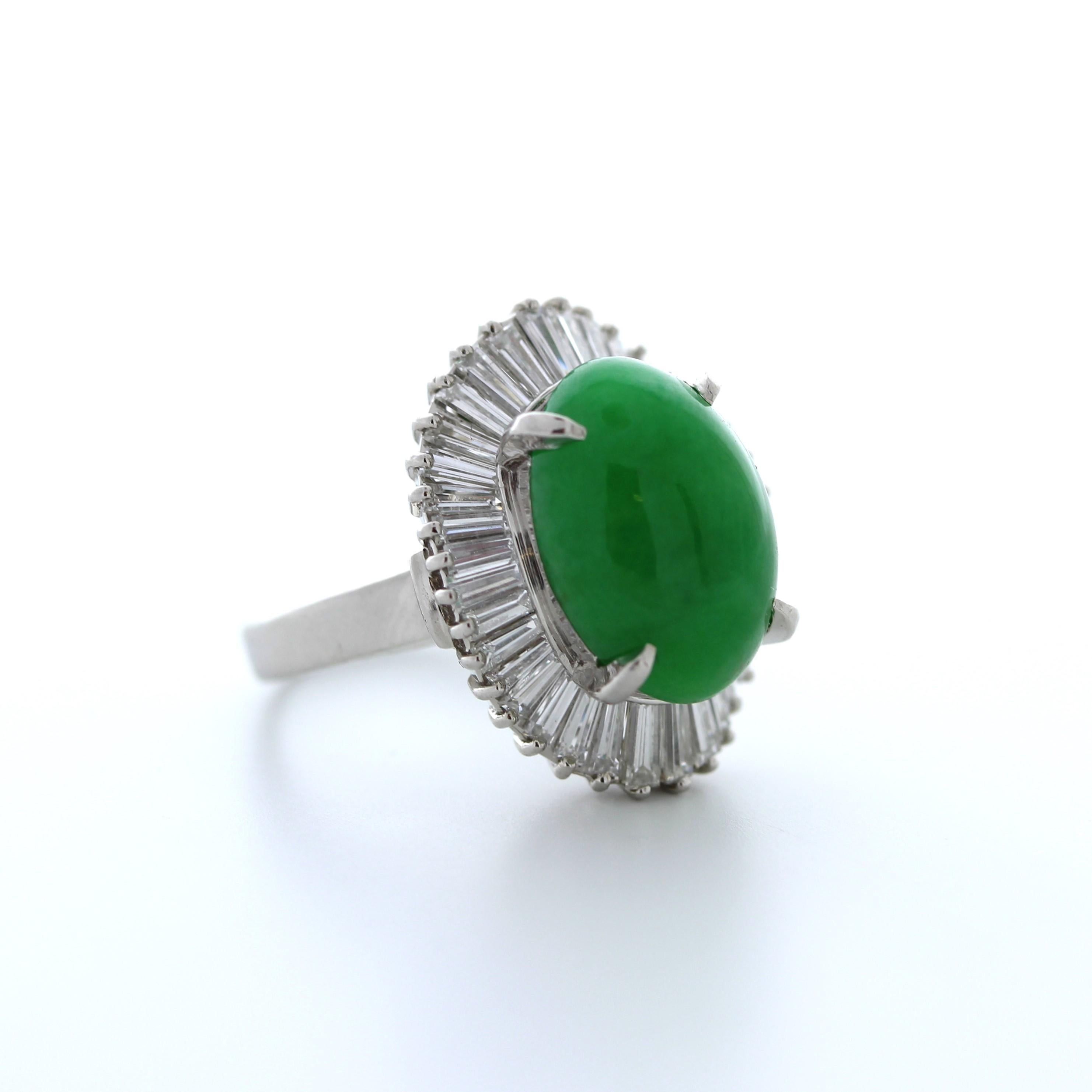 Overall, the 5.00 carat total weight green cabochon and 2.50 carat 37 baguette diamond fashion ring in platinum is a statement piece of jewelry that is perfect for those who want to add a touch of luxury and sophistication to their wardrobe. It is