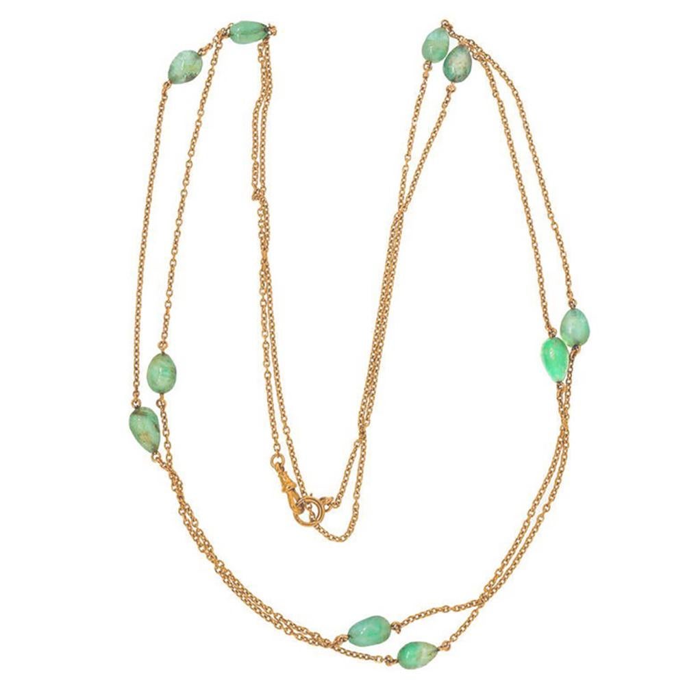 Natural pear shaped emerald necklace. Circa 1860s Victorian gold long chain in handmade 15k yellow gold chain with 10 genuine Emerald beads approx. 50.00cts total. 58 inches long. Can be worn single, double or triple. Center section 12 inches of