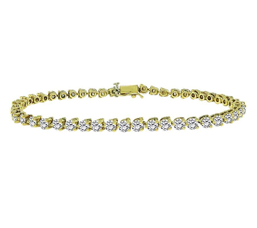 Taille ronde Bracelet tennis en or avec diamants de 5.00 carats en vente