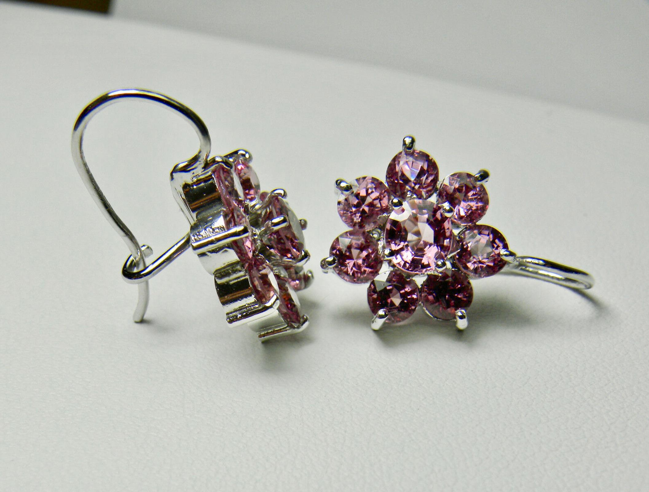 A beautiful pair of bright and shining old cut spinel pink-rose/ clarity VS, together weighing 5.00 carats, swing and sway and sparkle from within their original 18K white gold settings.
Measurement Earrings: 22.0mmx15.00mm
Earrings Weight: