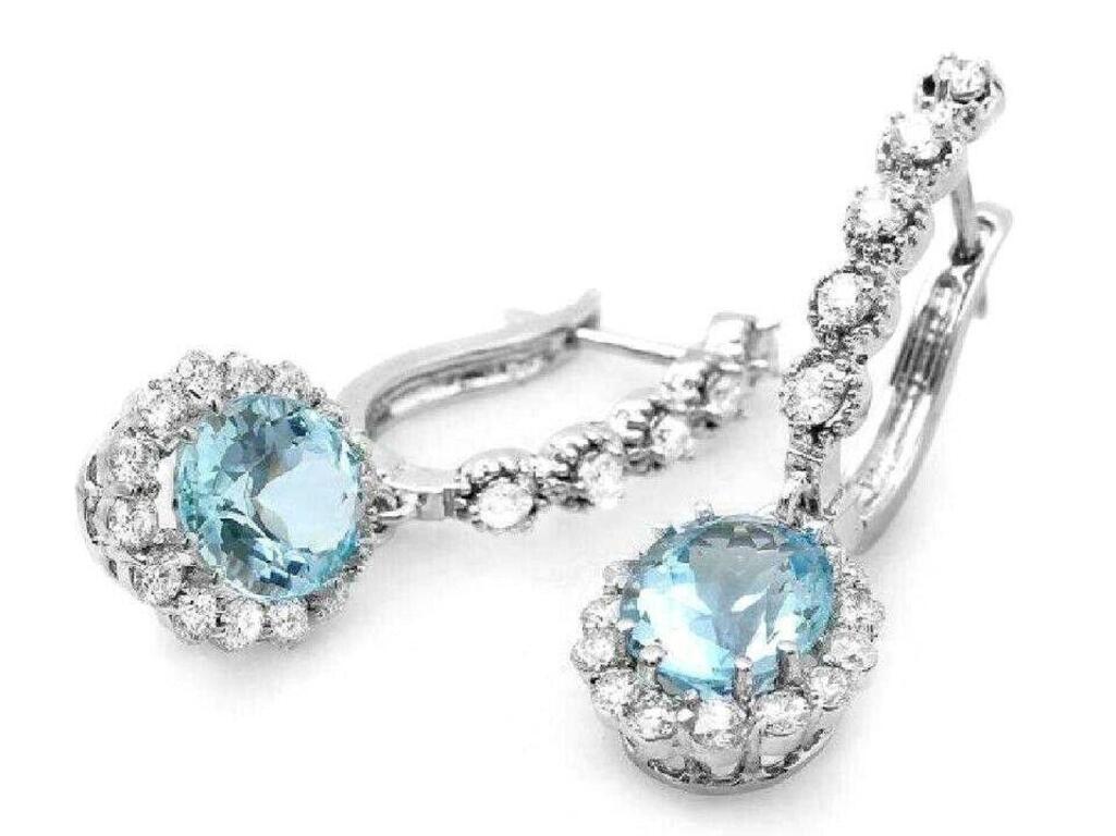 Exquisite 5.00 Carats Natural Aquamarine and Diamond 14K Solid White Gold Earrings

Amazing looking piece!

Total Natural Round Cut White Diamonds Weight: 1.00 Carats (color G-H / Clarity SI1-SI2)

Total Natural Oval Blue Aquamarines Weight is: 4.00