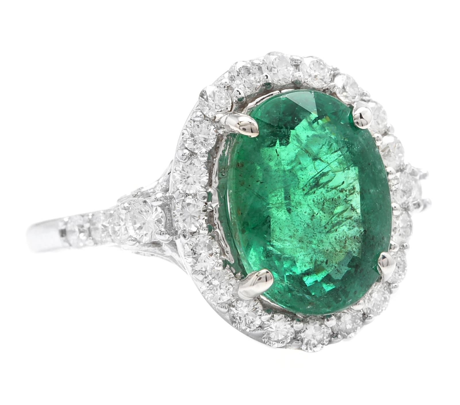 5.00 Carats Natural Emerald and Diamond 14K Solid White Gold Ring

Suggested Replacement Value: $6,500.00

Total Natural Oval Green Emerald Weight is: Approx. 4.20 Carats (transparent)

Emerald Treatment: Oiling  

Emerald Measures: Approx. 11.50 x