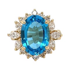 5.00ct Oval Swiss Blue Topaz Ring in 14k Yellow Gold with 1.02tcw Diamonds