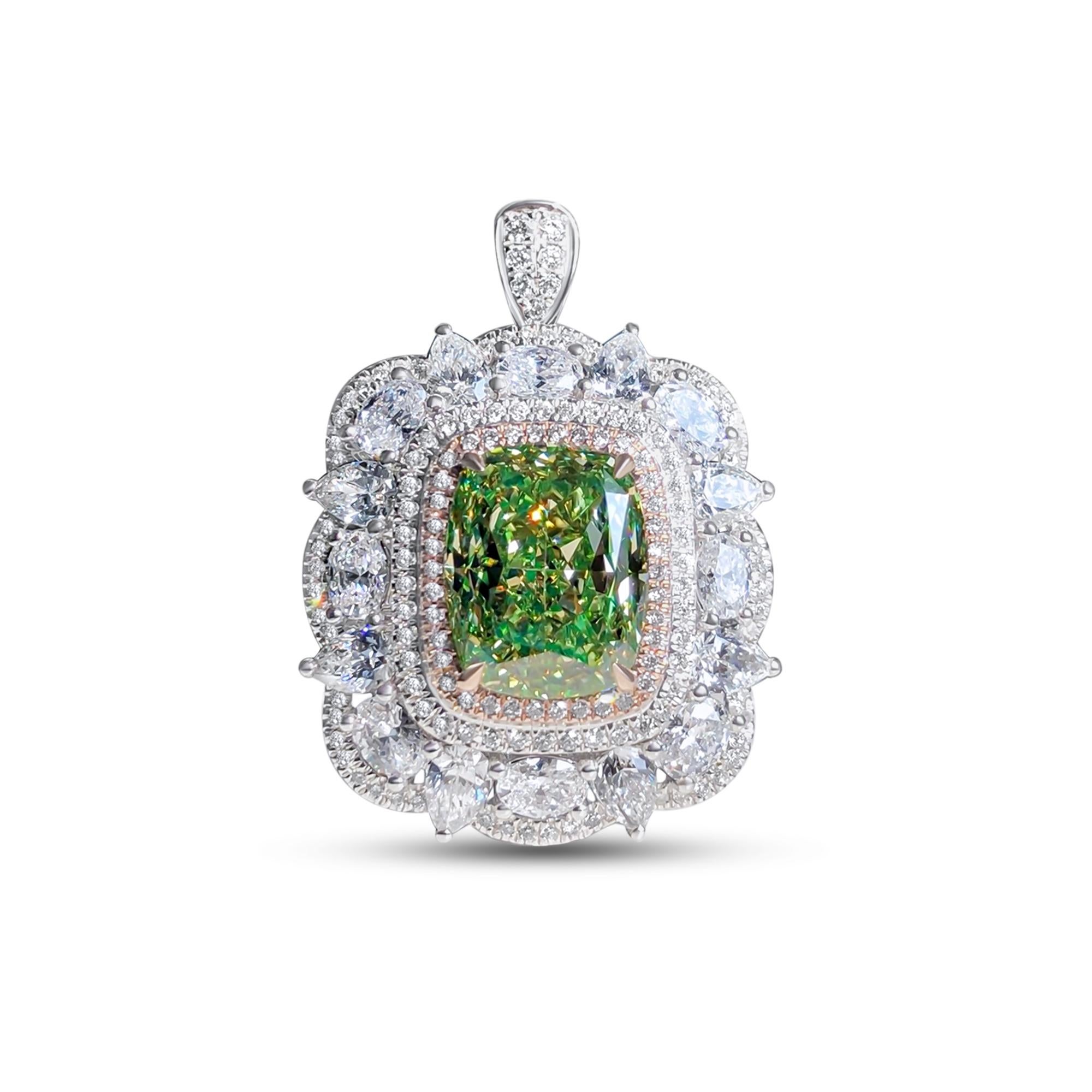 We invite you to discover this unique ring set with a GIA certified cushion cut green diamond of 5.01 carats enhanced with a double halo of colorless and pink diamonds embellished with multi cut diamonds totaling 3.018ct. 
Versatile, you can also