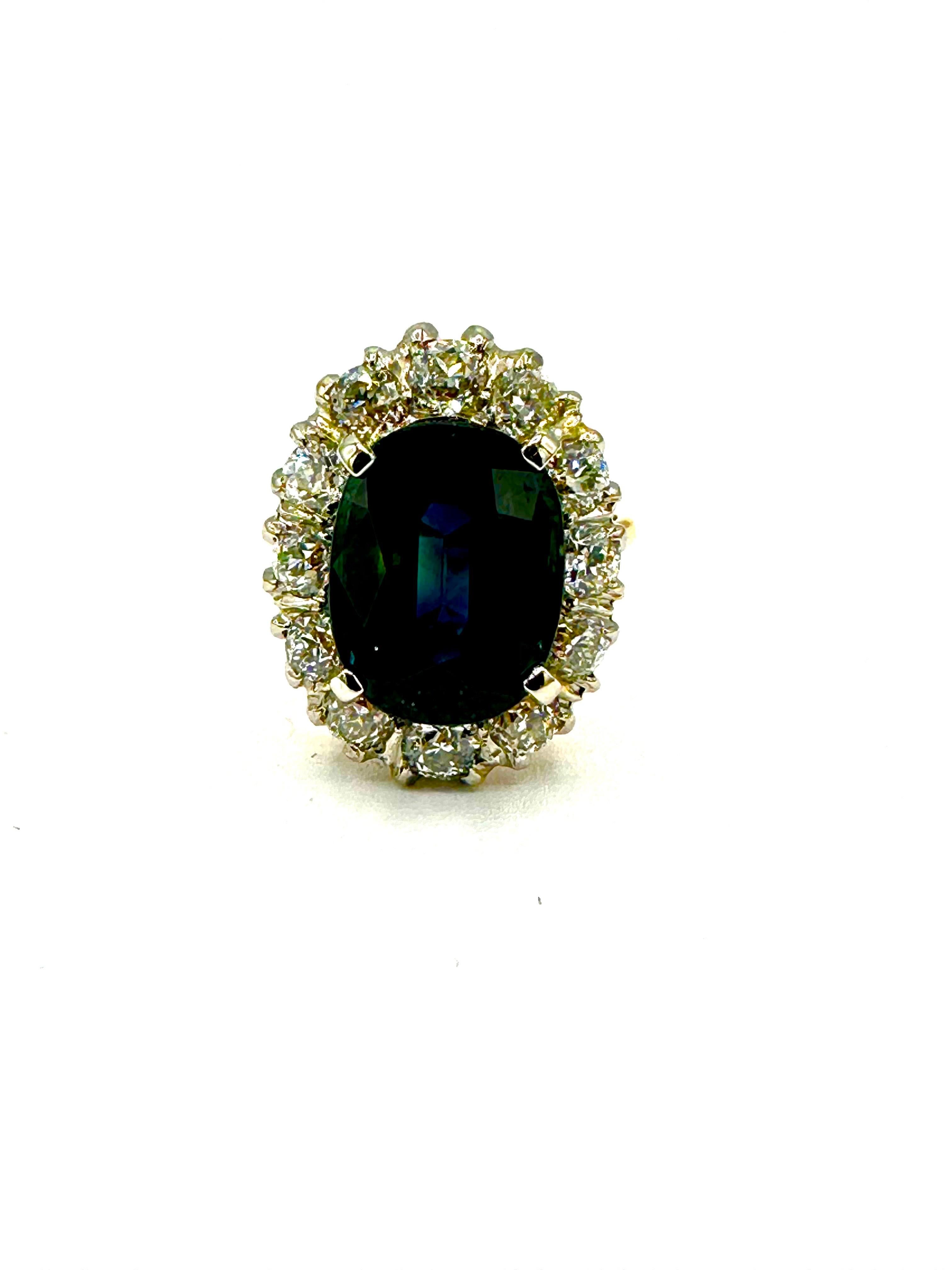 Oval Cut 5.01 Carat Greenish Blue Oval Sapphire and Diamond Platinum and Gold Ring For Sale