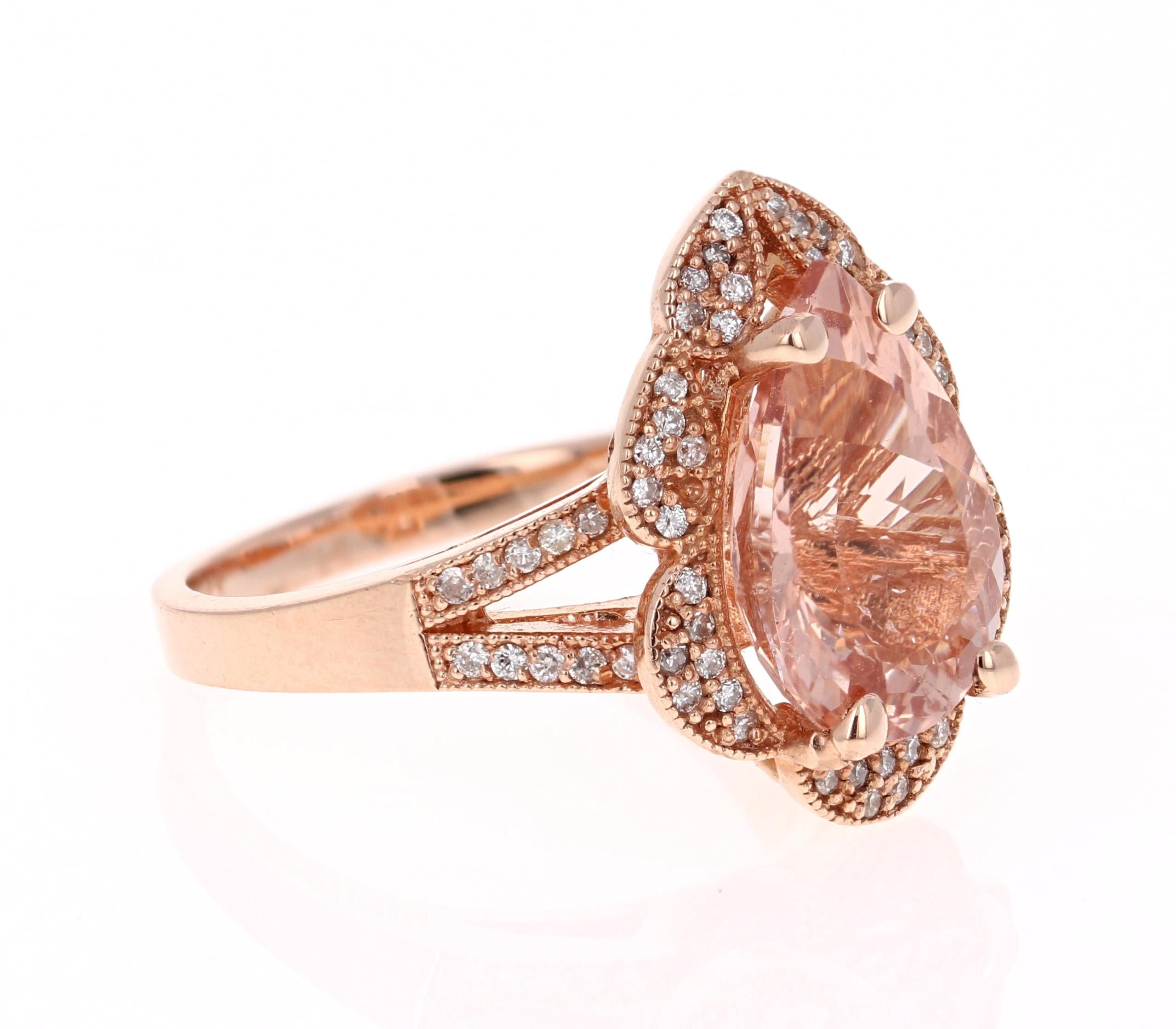 Gorgeous and Unique Morganite Diamond Ring! 

This Morganite ring has a 4.59 Carat Pear Cut Cut Morganite and is surrounded by 67 Round Cut Diamonds that weigh 0.42 Carats.  The diamonds have a clarity and color of VS-H. The total carat weight of