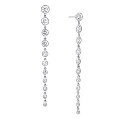 5.01 Carats of Graduated Diamond Earrings in Platinum
