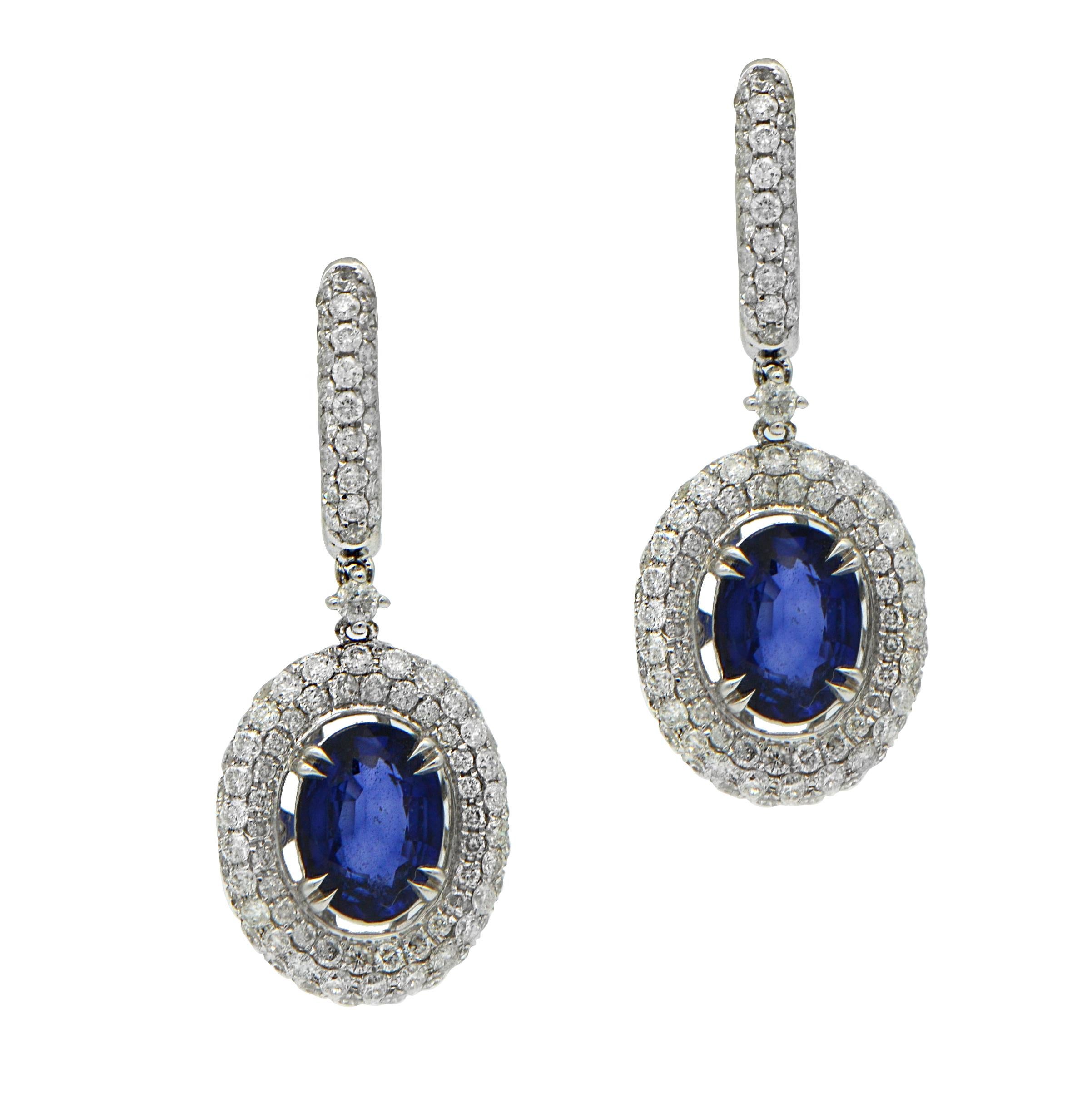5.01 Total Carat Fancy Sapphire Earrings with Pave Diamond Halo in 18K White Gold

These glamorous sapphire earrings are perfectly handcrafted from the finest diamonds, sapphire, and white gold. The diamond pave creates a dramatic styling that adds