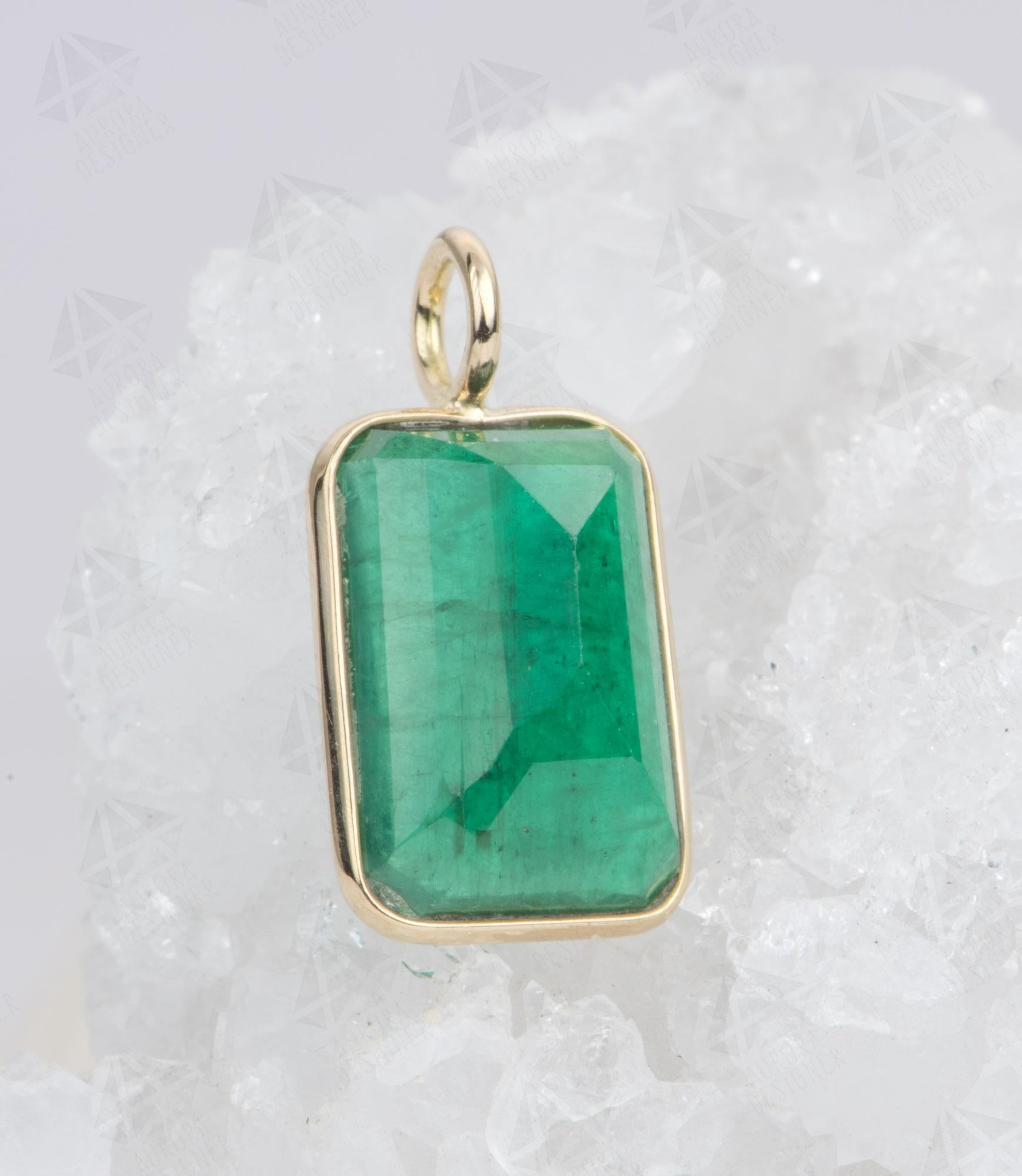 ♥  This faceted rectangle-shaped emerald is set in a simple gold bezel with a gold bail 
♥  This listing is for the pendant ONLY.

♥ Material: 14K yellow gold
♥ Gemstone: Emerald, 5.01ct
♥ Measurements: The overall setting measures 10.2mm in width,
