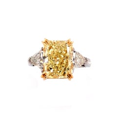 5.01ct GIA Radiant Cut Fancy Light Yellow Platinum Ring with 0.85ctw Diamonds