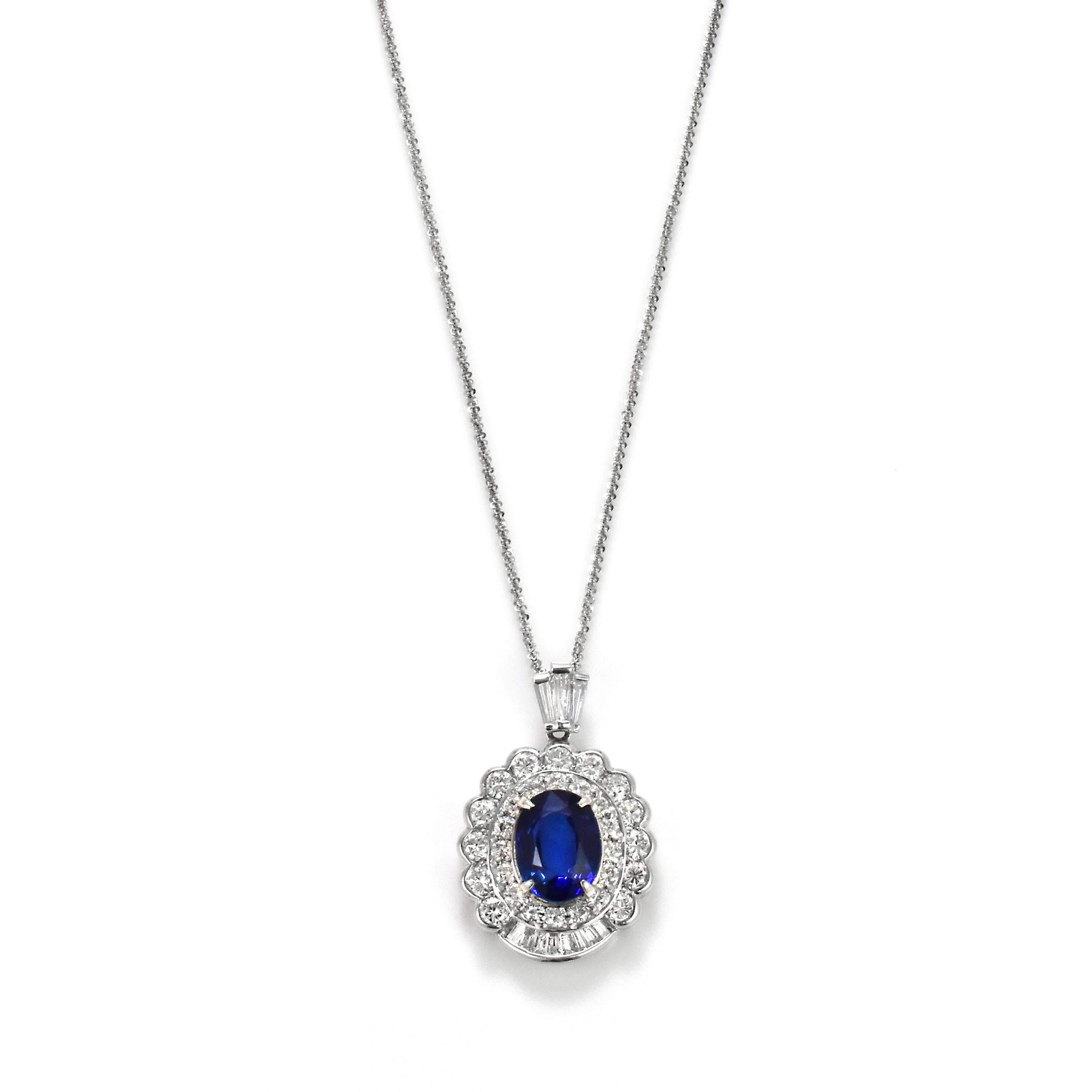 Oval Cut 5.02 Carat Natural Royal Blue Sapphire and Diamond Pendant Made in Platinum For Sale