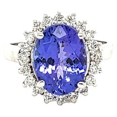 Bague en or blanc 14 carats avec tanzanite de 5,02 carats et diamants