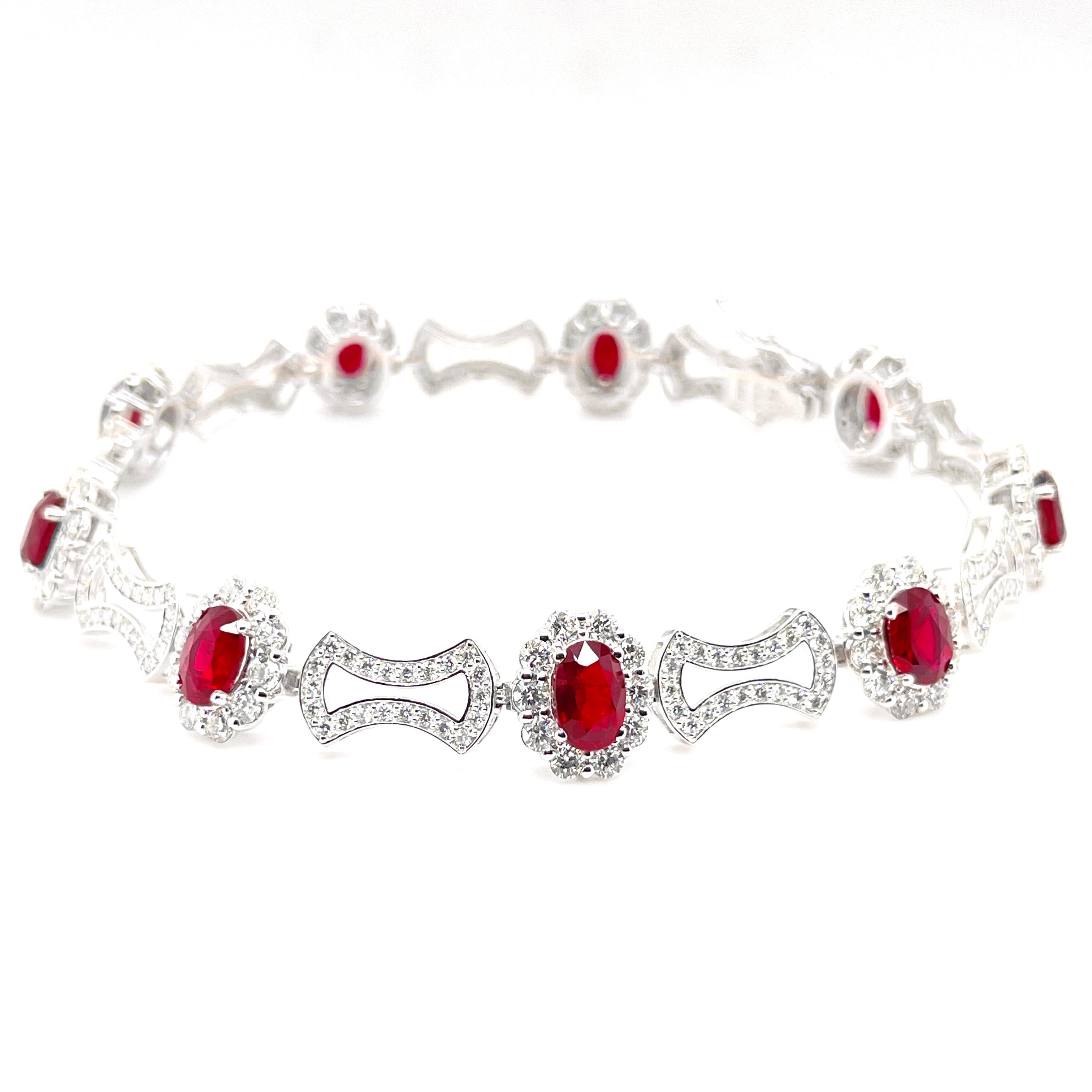 A beautiful Tennis Bracelet featuring a total of 5.02 Carats of Natural Rubies and 3.67 Carats of Diamond Accents set in Platinum. The Rubies are of 6x4 mm size. Rubies are referred to as 