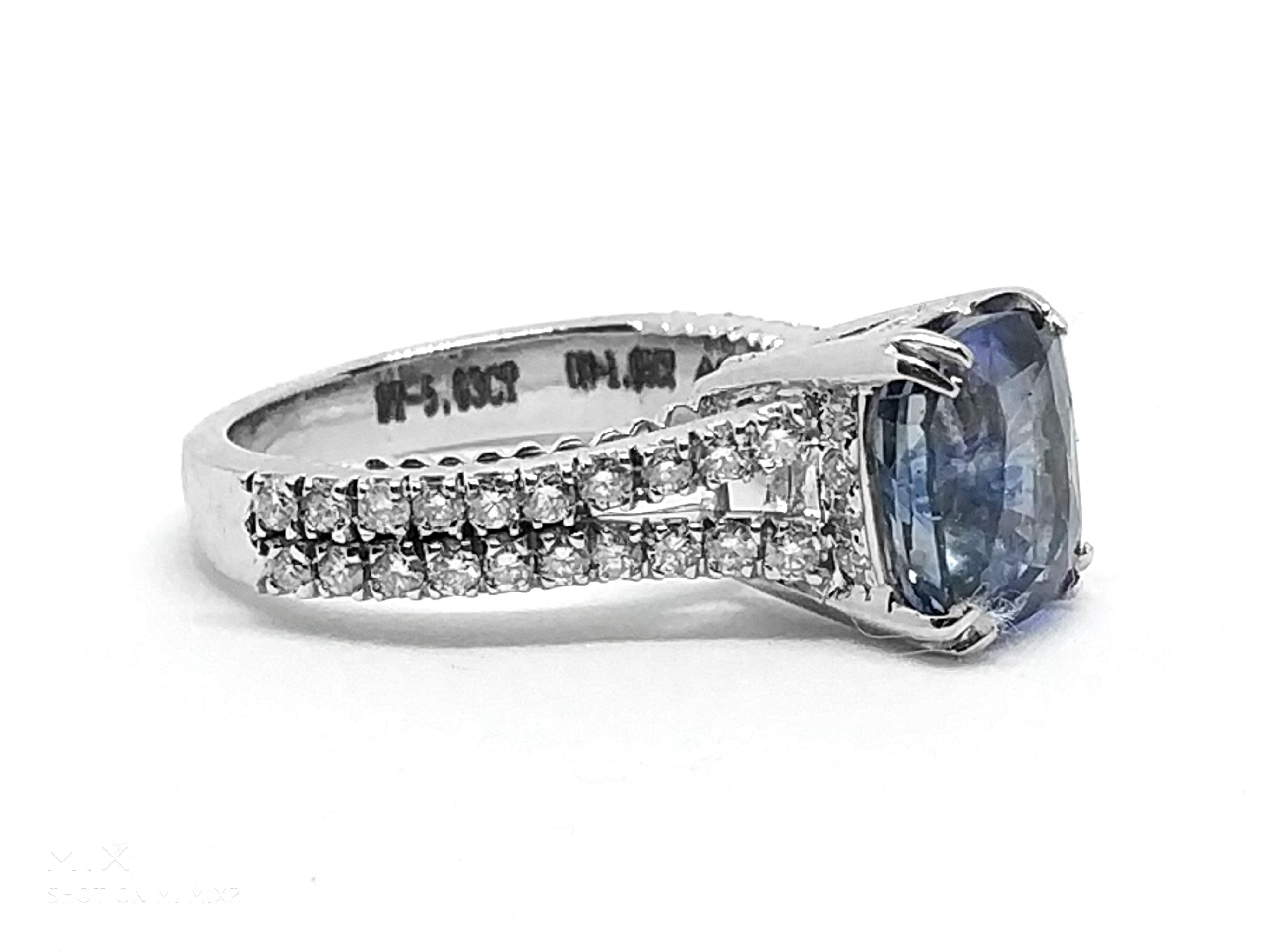 Emerald Cut 5.03 Carat Blue Ceylon Sapphire 1.05 Carat Diamond Ring For Sale
