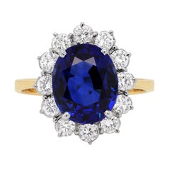 Verlobungsring mit 5,03 Karat blauem Saphir und Diamant in 18 Karat Gold mit Cluster