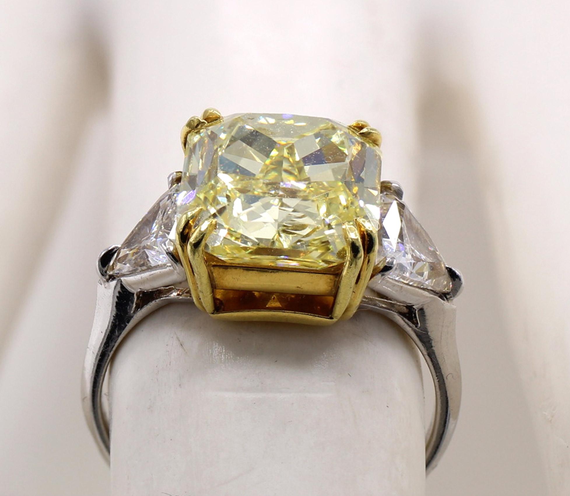 Women's or Men's 5.03 Carat Fancy Intense Yellow Radiant Cut Diamond Ring For Sale