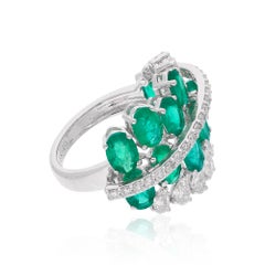 5.03 Carat Oval Natural Emerald Ring 1.76 Carat Pear Diamond 18 Karat White Gold