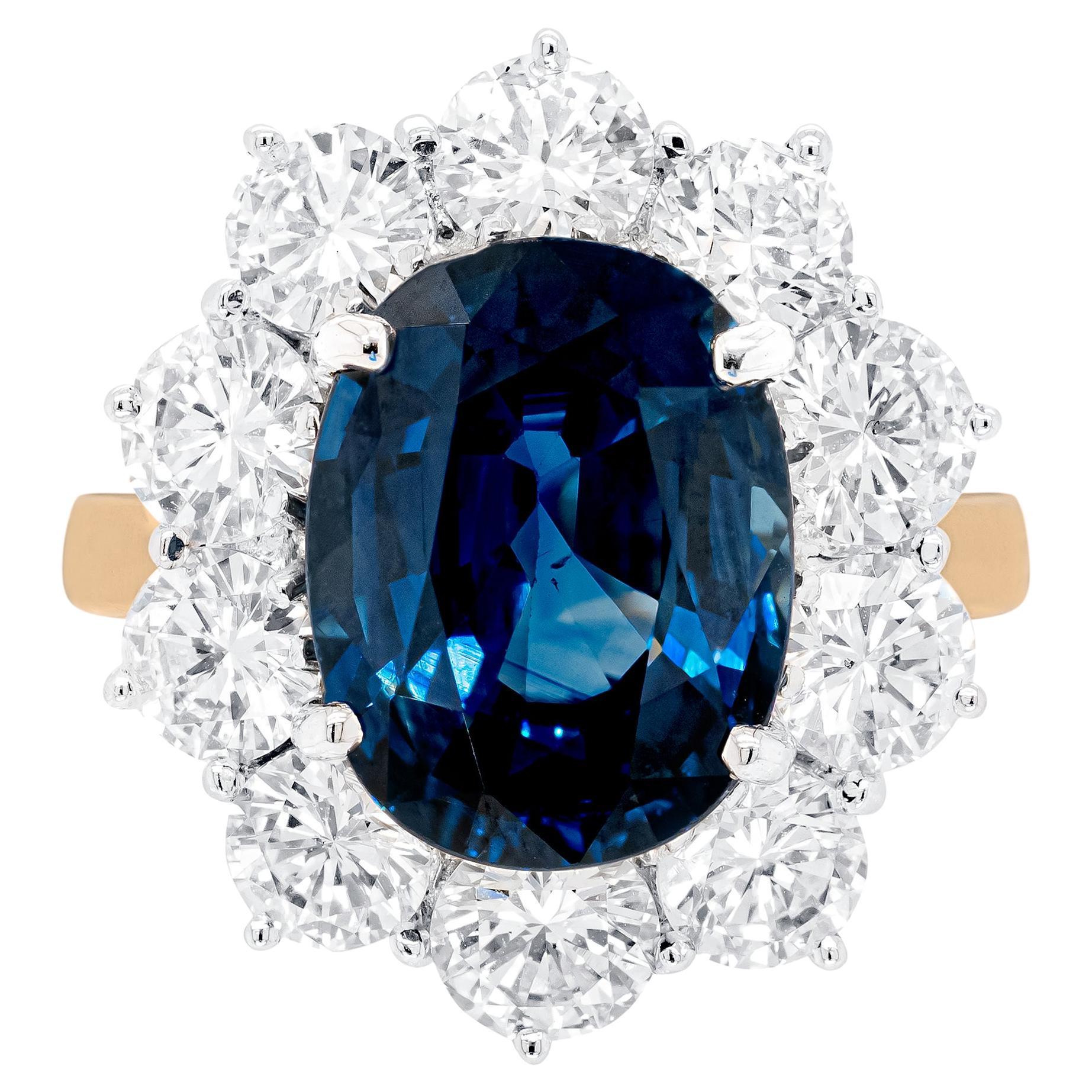 5.03ct Oval Sapphire and Diamond 18 Carat Gold Cluster Engagement Ring For Sale