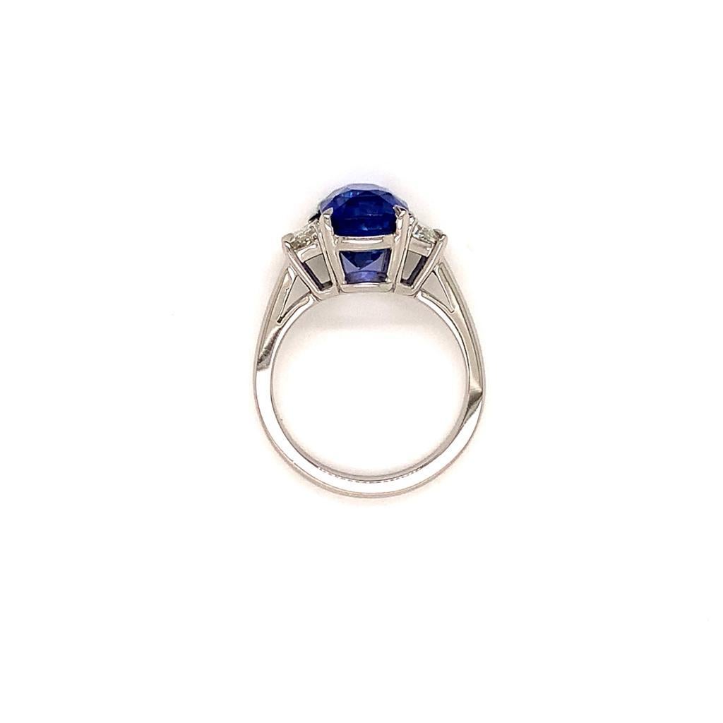 Women's 5.04 Carat Cushion cut Blue Sapphire and Diamond Three-Stone Ring in Platinum For Sale