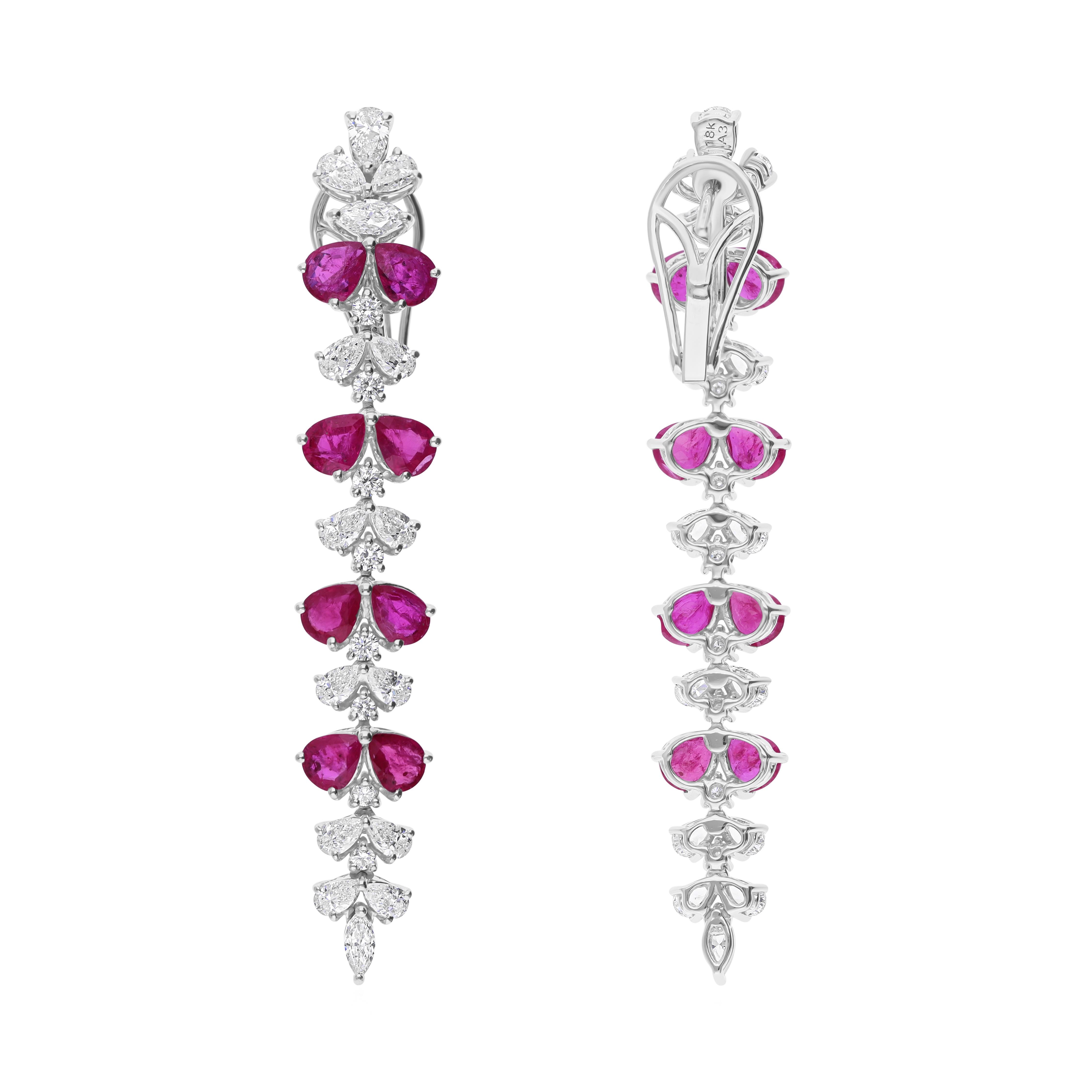 Cast from 18-karat gold, these exquisite earrings are handset with 5.04 carats ruby and 3.11 carats of sparkling diamonds.

FOLLOW SPECTRUM JEWELS storefront to view the latest collection & exclusive pieces. Spectrum Jewels is proudly rated as a Top