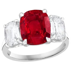 5.05 Carat Cushion Cut Ruby and Diamond Three-Stone Engagement Platinum Ring 5.05 Carat Cushion Cut Ruby and Diamond Three-Stone Engagement Platinum Ring