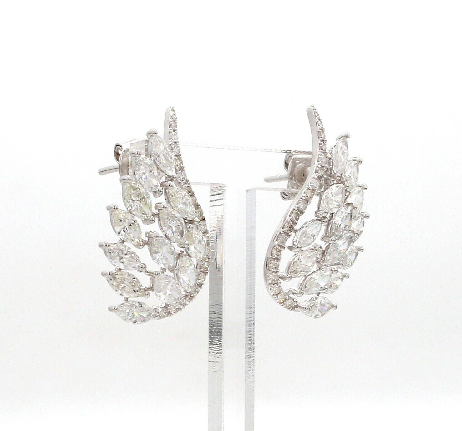 Modern 5.05 Carat Diamond 18 Karat White Gold Wing Earrings For Sale