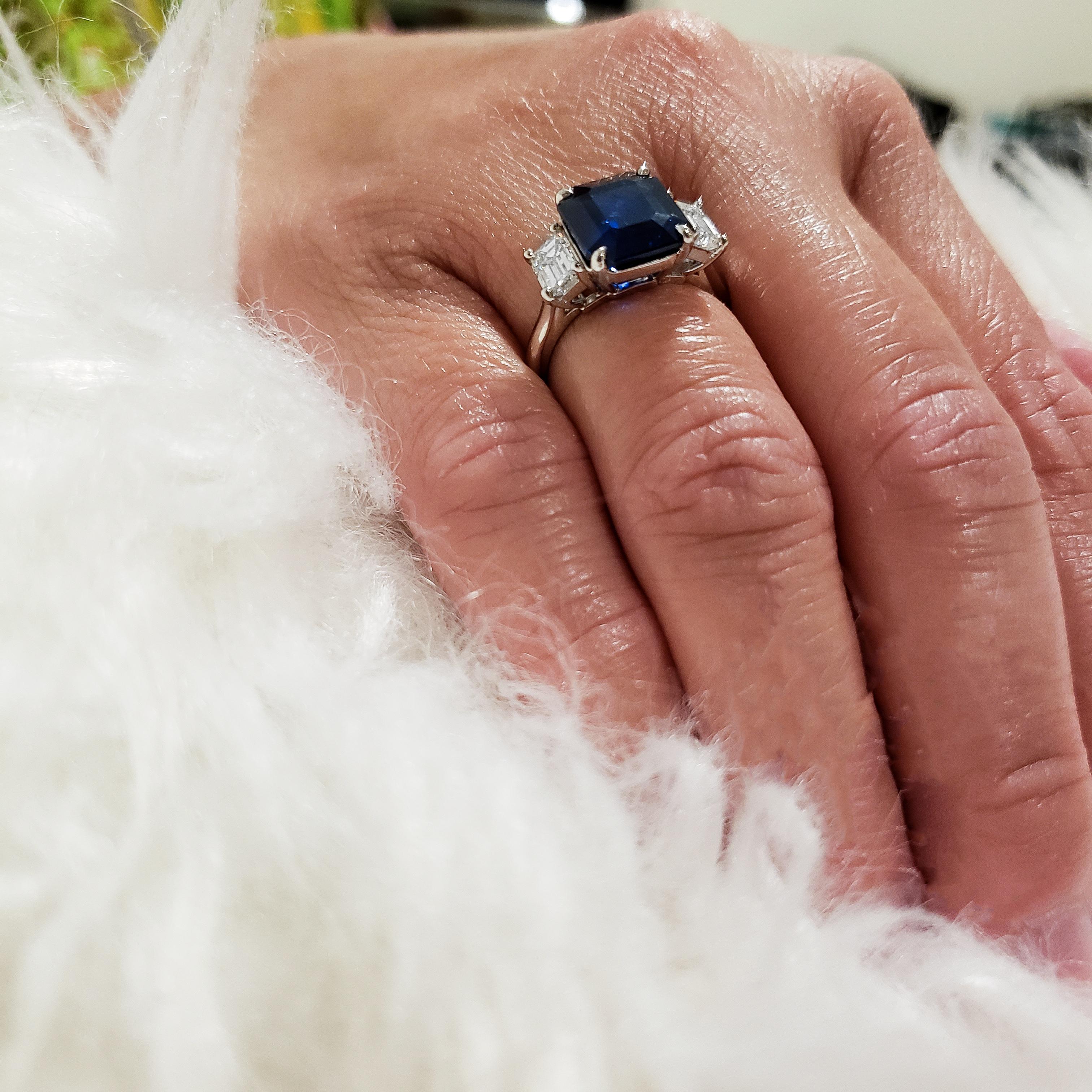 Contemporary 5.86 Carat Emerald Cut Blue Sapphire and Diamond Three-Stone Engagement Ring