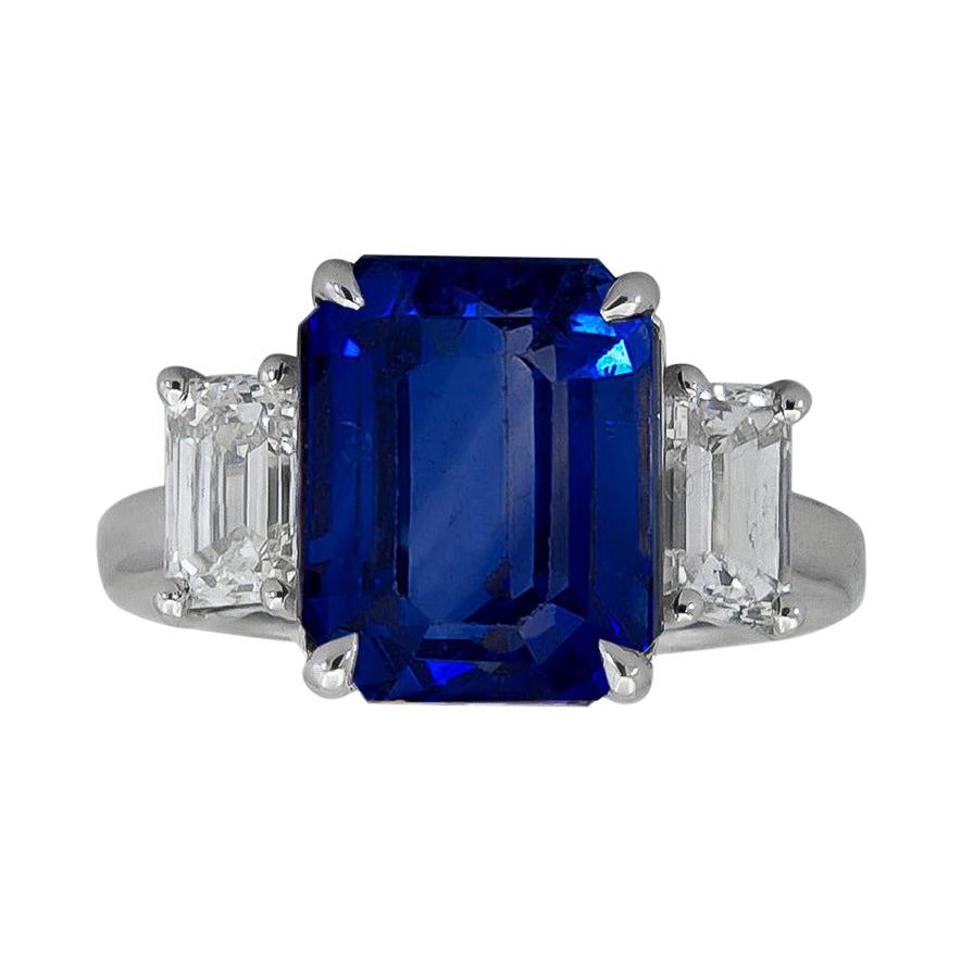 5.86 Carat Emerald Cut Blue Sapphire and Diamond Three-Stone Engagement Ring