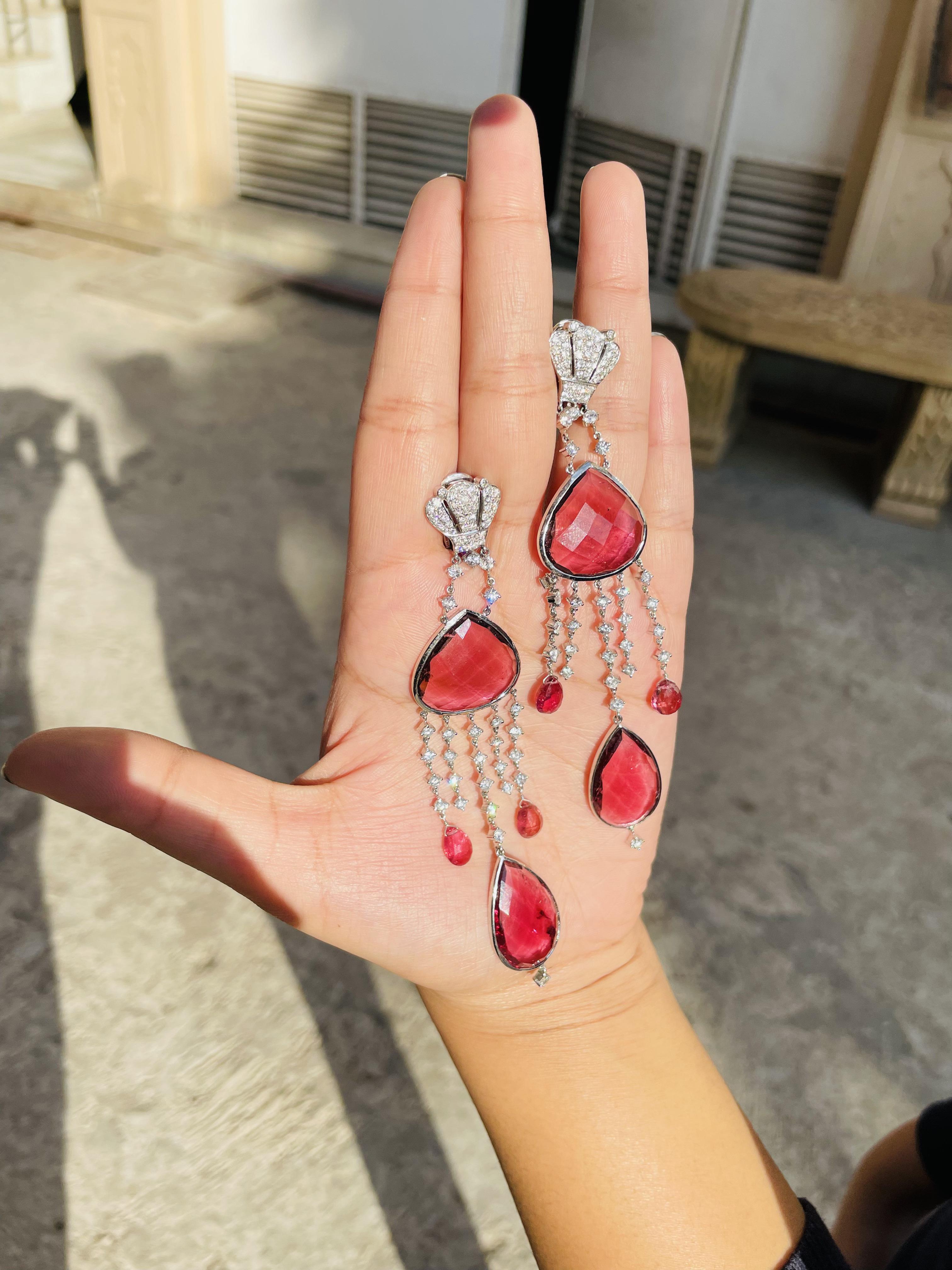 Ruby Dangle earrings to make a statement with your look. These earrings create a sparkling, luxurious look featuring mixed cut gemstone.
If you love to gravitate towards unique styles, this piece of jewelry is perfect for you.

PRODUCT DETAILS :-

>