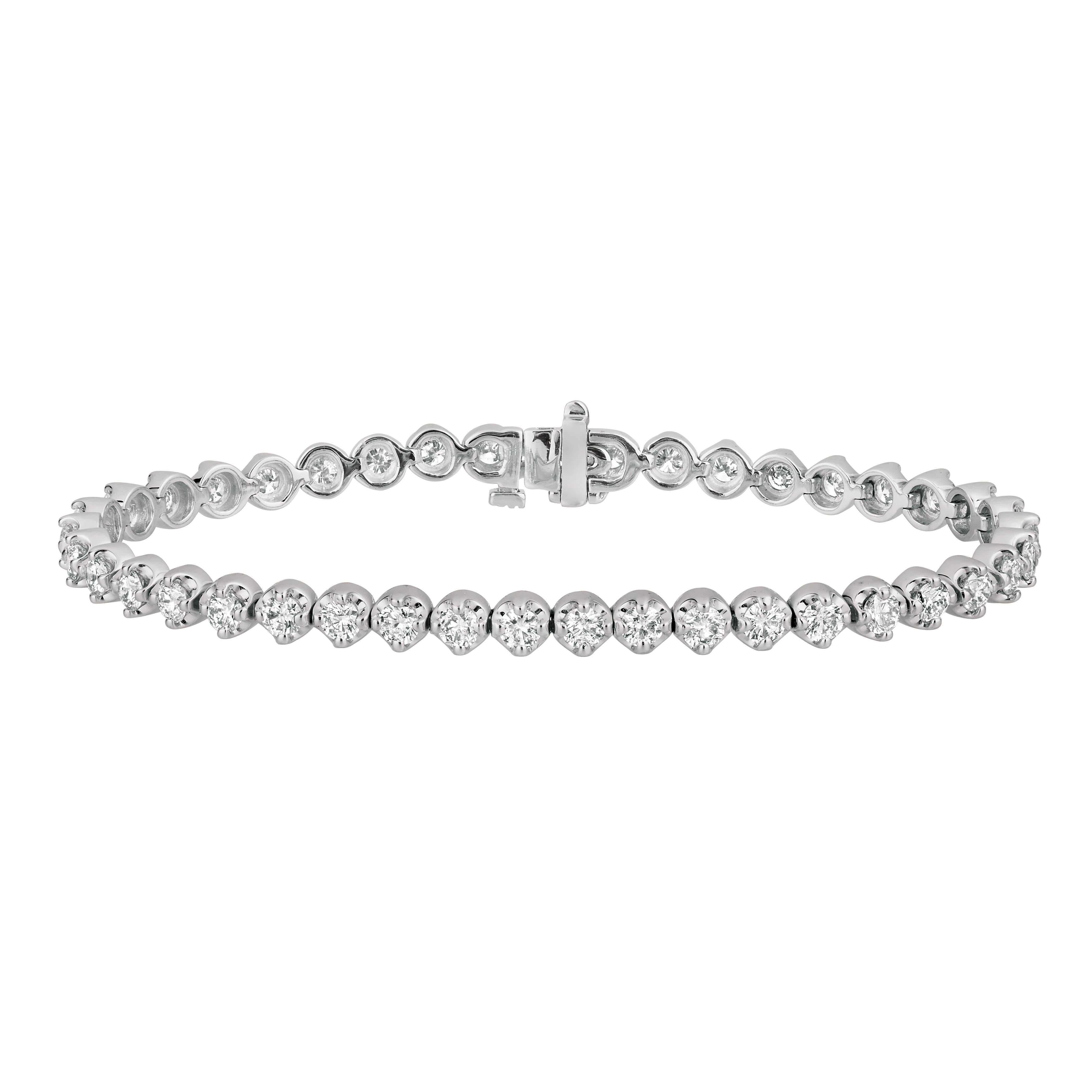 
5.05 Carat Natural Diamond Tennis Bracelet G SI 14K Yellow Gold 7''

    100% Natural Diamonds, Not Enhanced in any way Round Cut Diamond Bracelet 
    5.05CT (12 points each stone)
    Color G-H 
    Clarity SI  
    14K Yellow Gold, Prong Style  