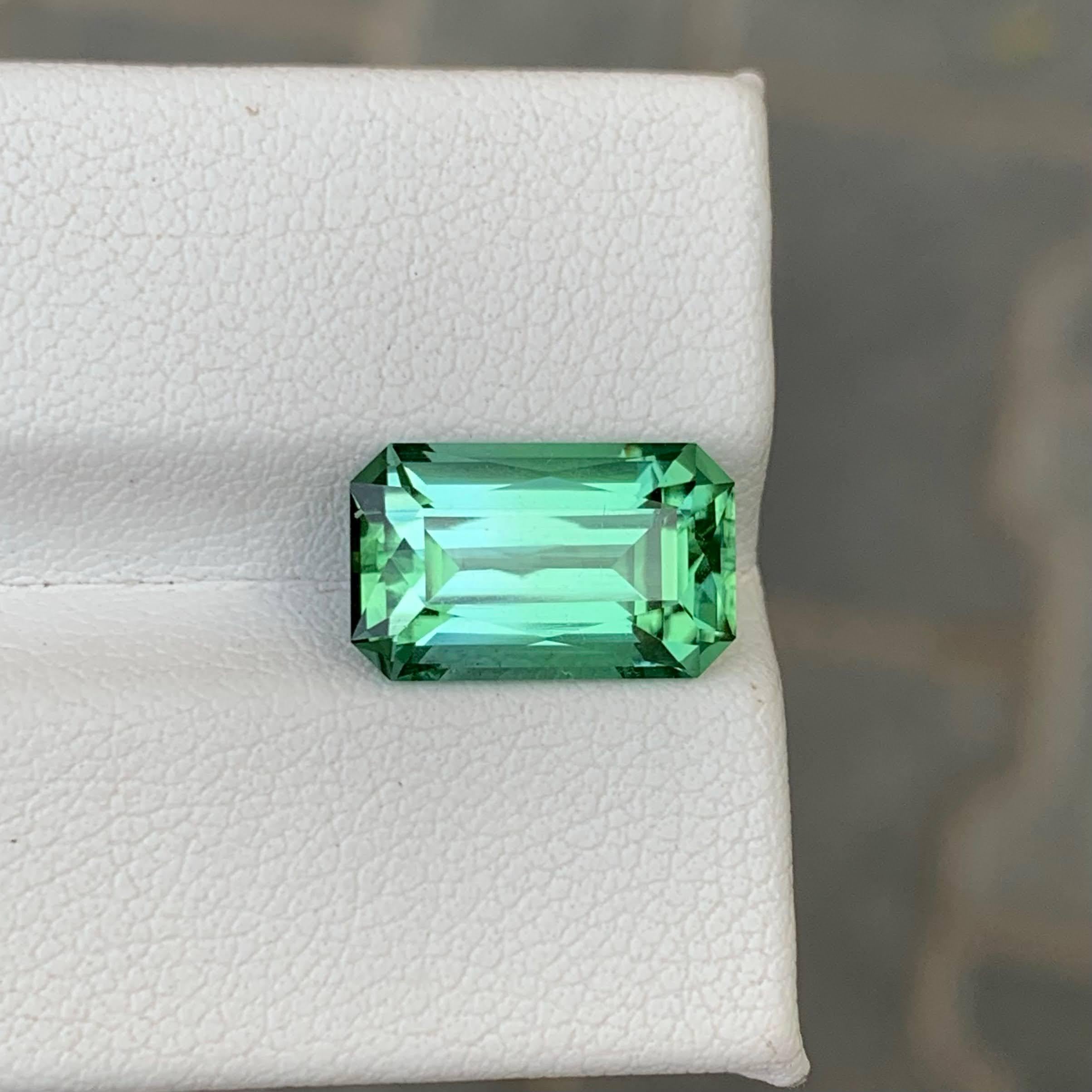 Weight 5.05 carat 
Dimensions 12.9x7.9x6.3mm
Treatment None
Origin Afghan 
Clarity Eye Clean 
Shape Cut Emerald 




Introducing a stunning 5.05 Carat Natural Loose Lagoon Green Tourmaline, expertly emerald cut to reveal its radiant color and