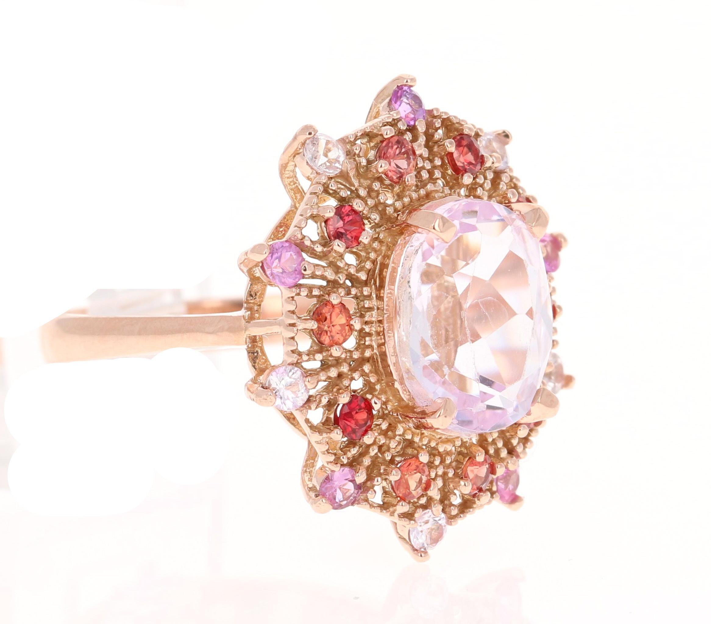 5.05 Carat Oval Cut Kunzite Multi-Sapphire Rose Gold Cocktail Ring

This beautiful vintage inspired setting with a modern colorful theme has an Oval Cut Kunzite weighing 4.13 carats and is surrounded by 20 Round Cut Multi-Colored Sapphires that