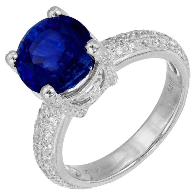 Bague de fiançailles en platine avec saphir bleu rond de 5,05 carats et diamants