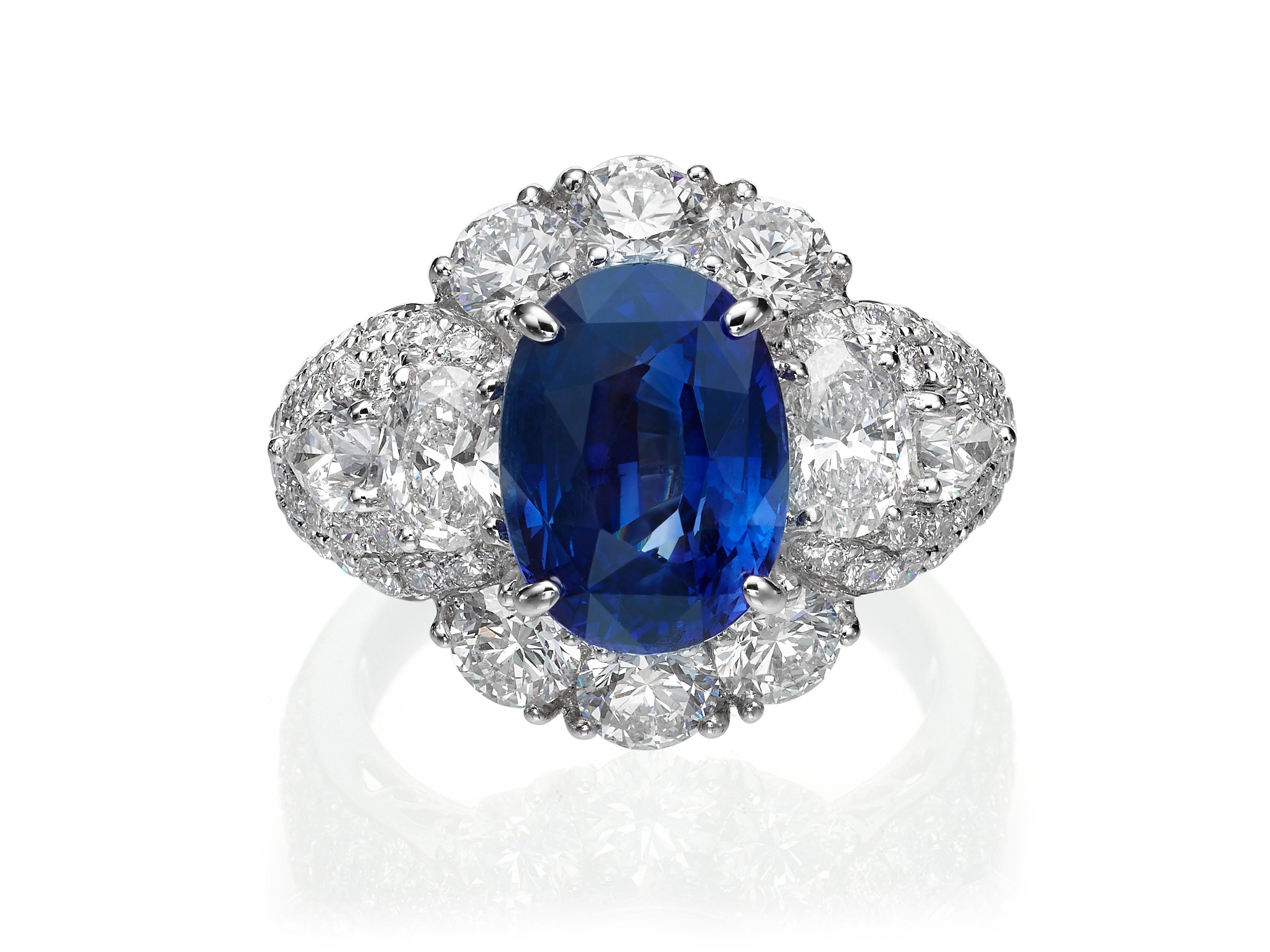 Contemporary 5.05 Carat Royal Blue Oval Ceylon Sapphire 18 Karat White Gold Diamond Ring