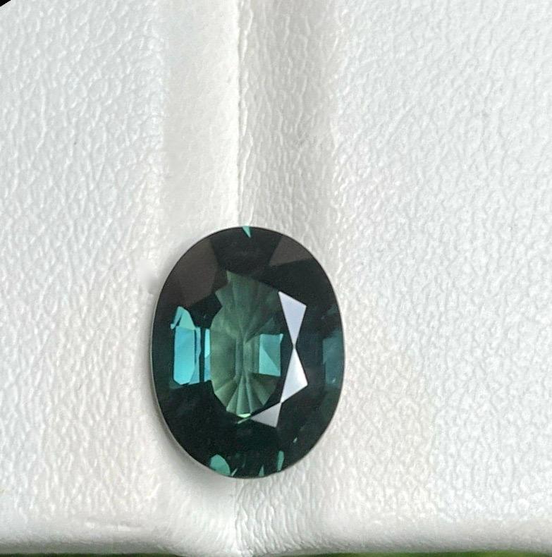 Stunning Natural Heated Teal Greenish Blue Sapphire
Carat: 5.05 carats
Shape: Oval
Measurement: 10.66 x 8.17 x 6.12 mm
Color: green-blue
Cut: Brilliant/Modified Brilliant
Clarity: VVS
**The price is for Sapphire only, but it can be made into a