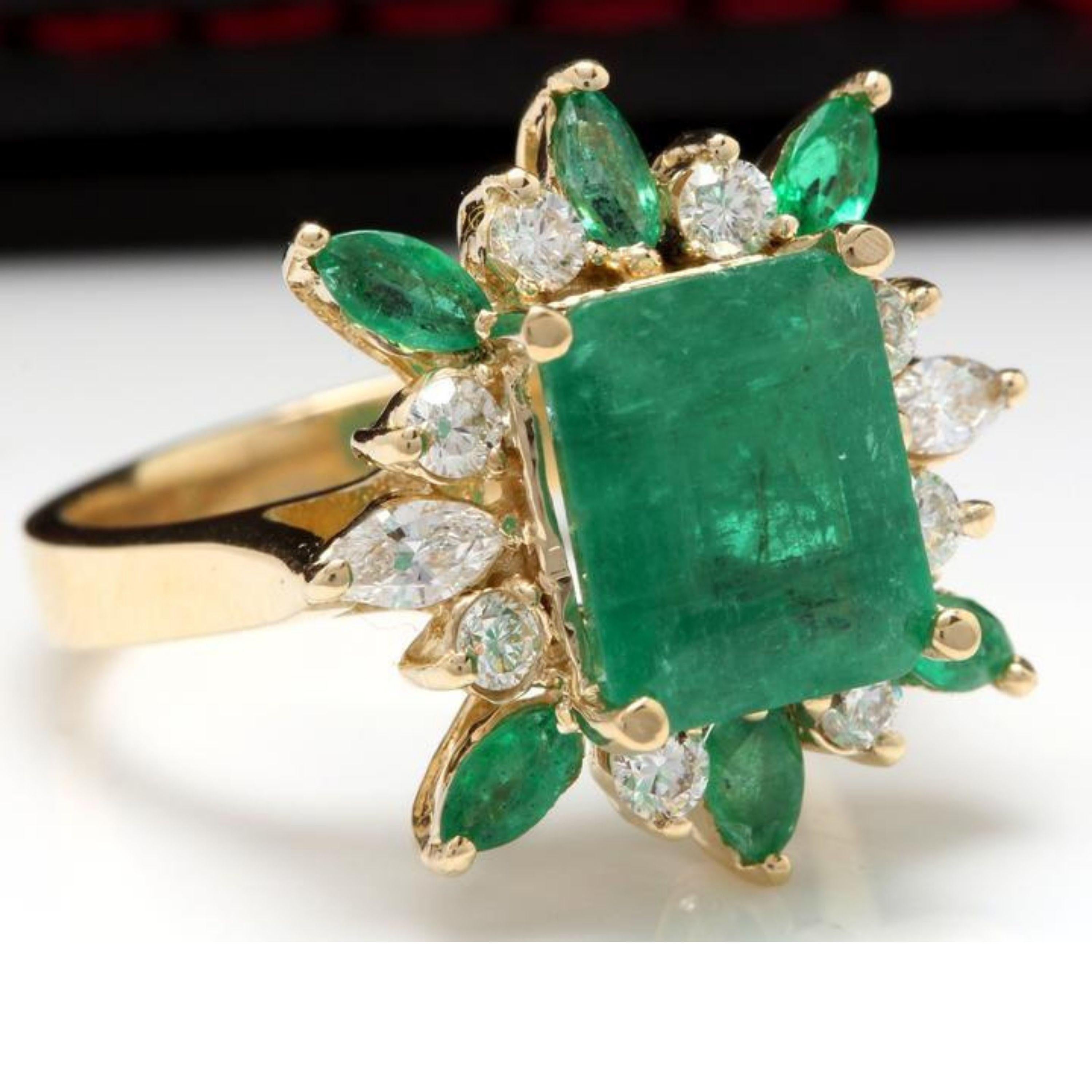 5.05 Carats Natural Emerald and Diamond 14K Solid Yellow Gold Ring

Total Natural Green Emerald Weight is: Approx. 3.95 Carats (transparent)

Emerald Measures: Approx. 9.23 x 7.70mm

Emerald Treatment: Oiling

Natural Round & Marquise Diamonds