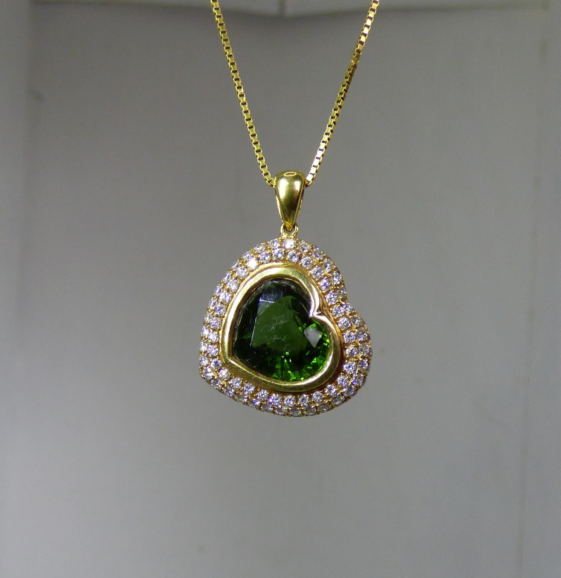 Contemporary 5.05ct Heart shaped Green Tourmaline and Diamond Pendant in 18K Gold For Sale