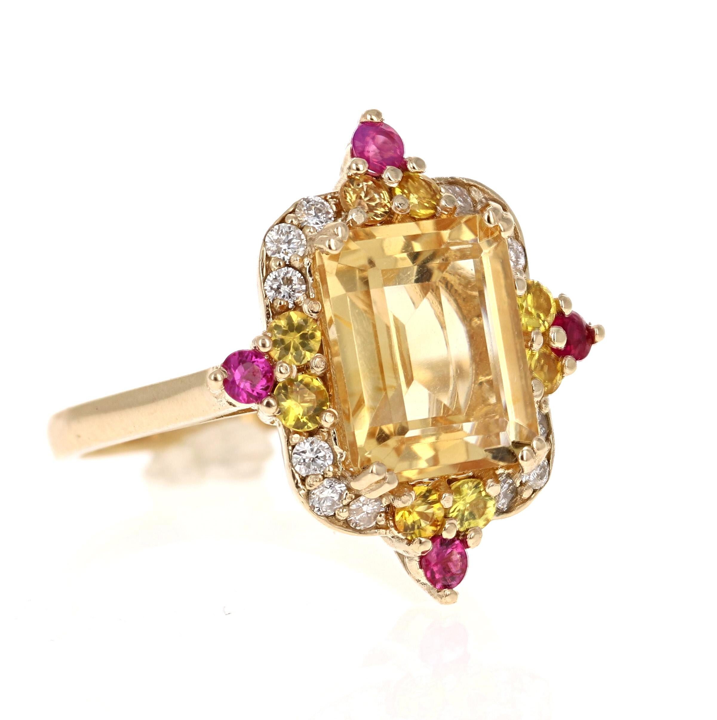 A stunning piece that can be a great alternative to a Yellow Diamond!

This gorgeous ring has a beautiful Emerald Cut Citrine Quartz weighing 4.03 Carats and is surrounded by 12 Round Cut Yellow and Pink Sapphires weighing 0.78 Carats and 12 Round