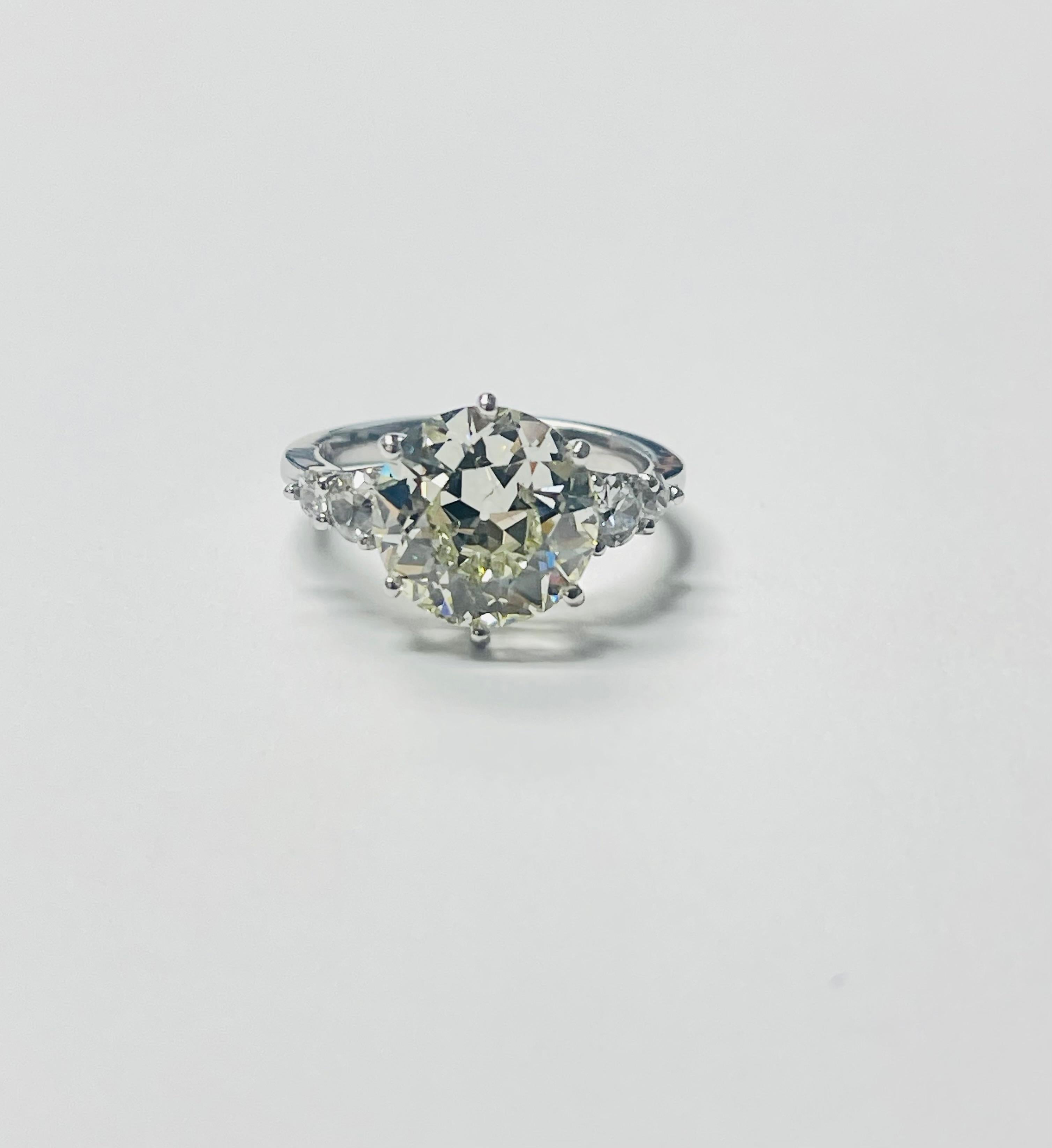White Old European Cut Diamond Engagement Ring beautifully handcrafted in platinum. 
This elegant gorgeous and classy diamond engagement ring is more beautiful in person than shown in the pictures. 

The details are as follows : 

Diamond weight :