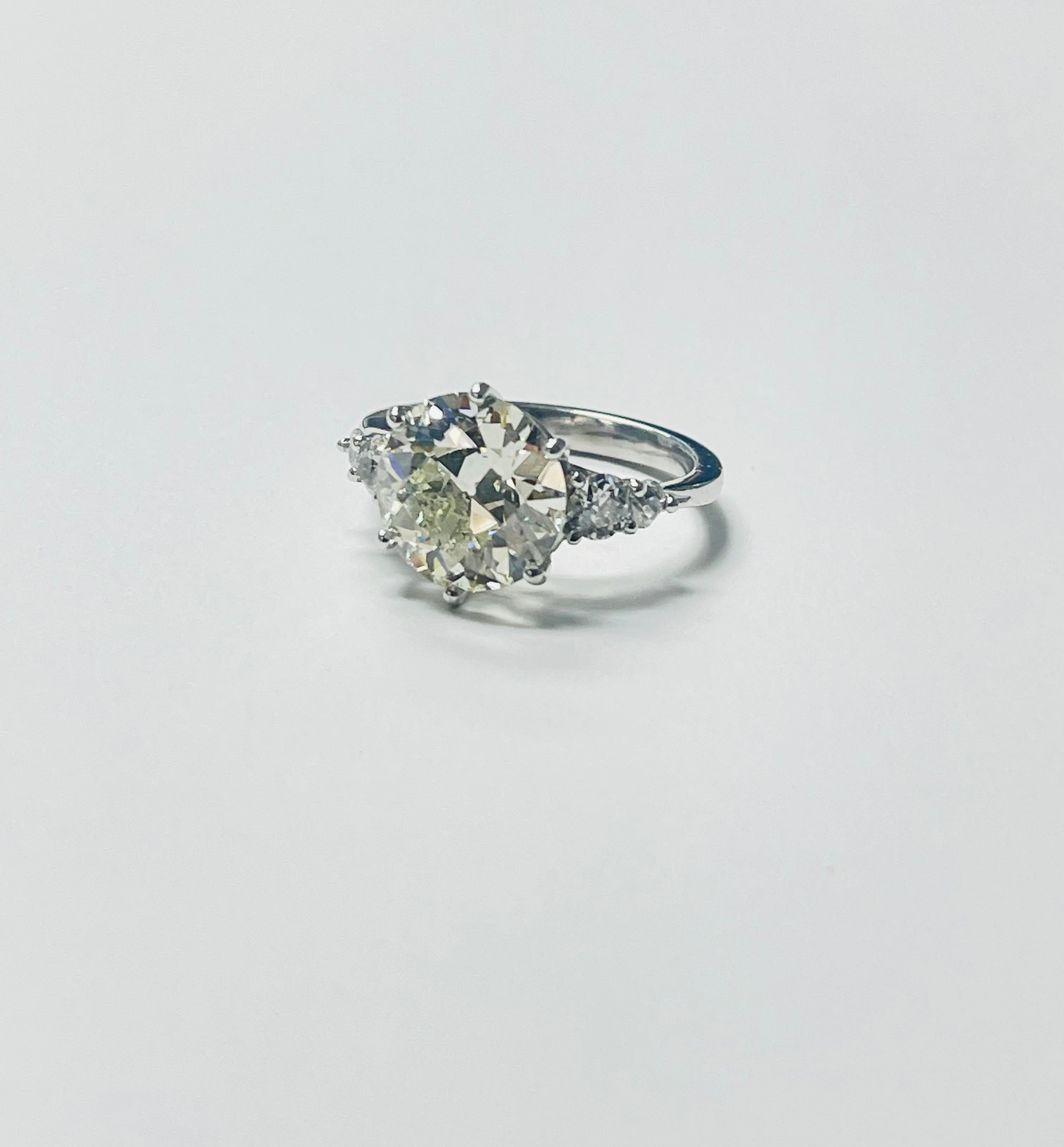 Women's or Men's 5.06 Carat Old European Cut Diamond Engagement Ring In Platinum, GIA Certified. For Sale