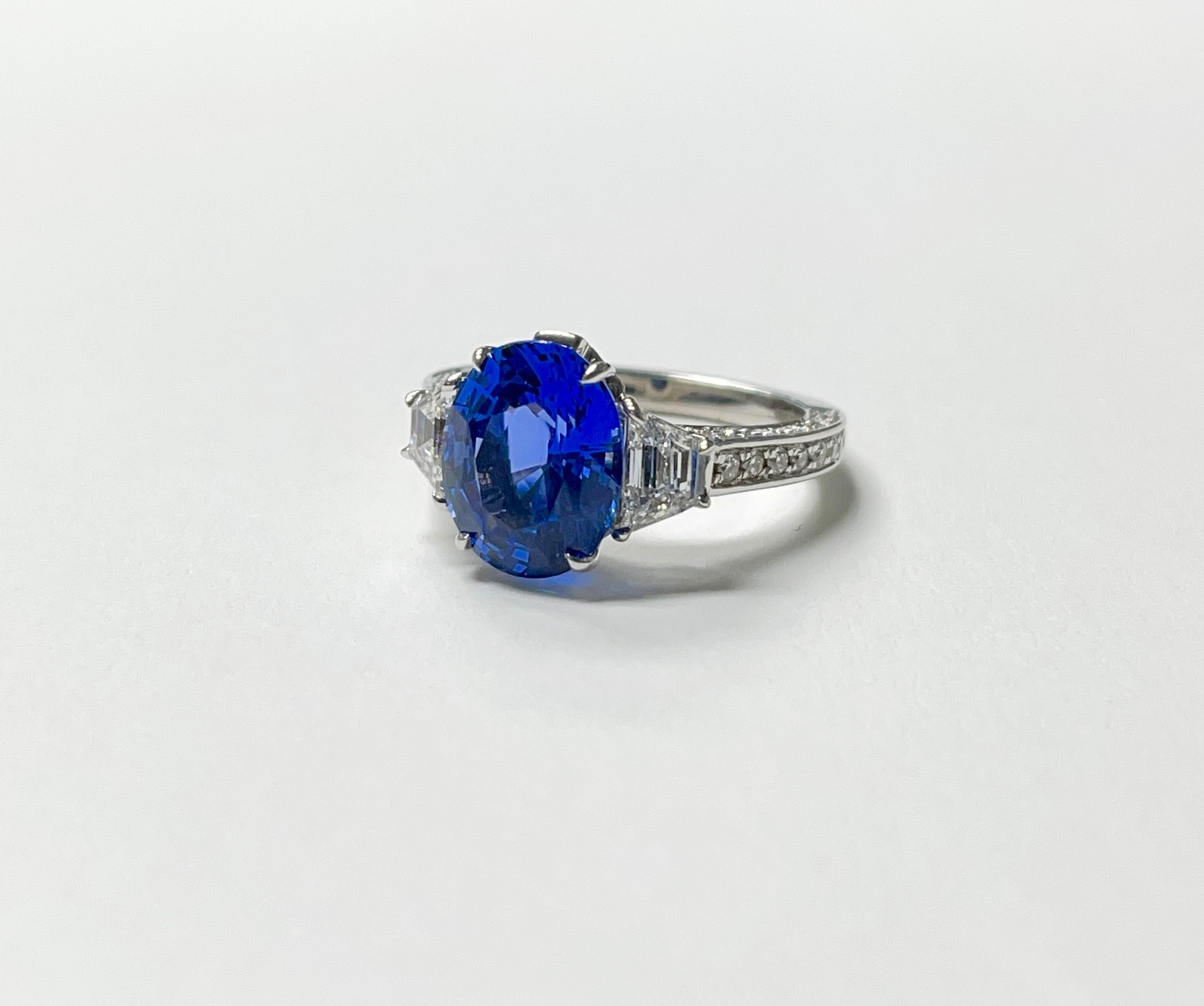 C. Dunaigre certified Gorgeous Blue Sapphire and Diamond engagement ring handcrafted in 18k white gold. 
The details are as follows : 
Blue sapphire weight : 5.06 carat 
Diamond weight : 2 carat 
Fancy diamond weight : 1.24 carat 
Metal : 18k white
