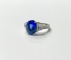 5.06 Carat Oval Blue Sapphire and Diamond Engagement Ring C.Dunaigre Certified.