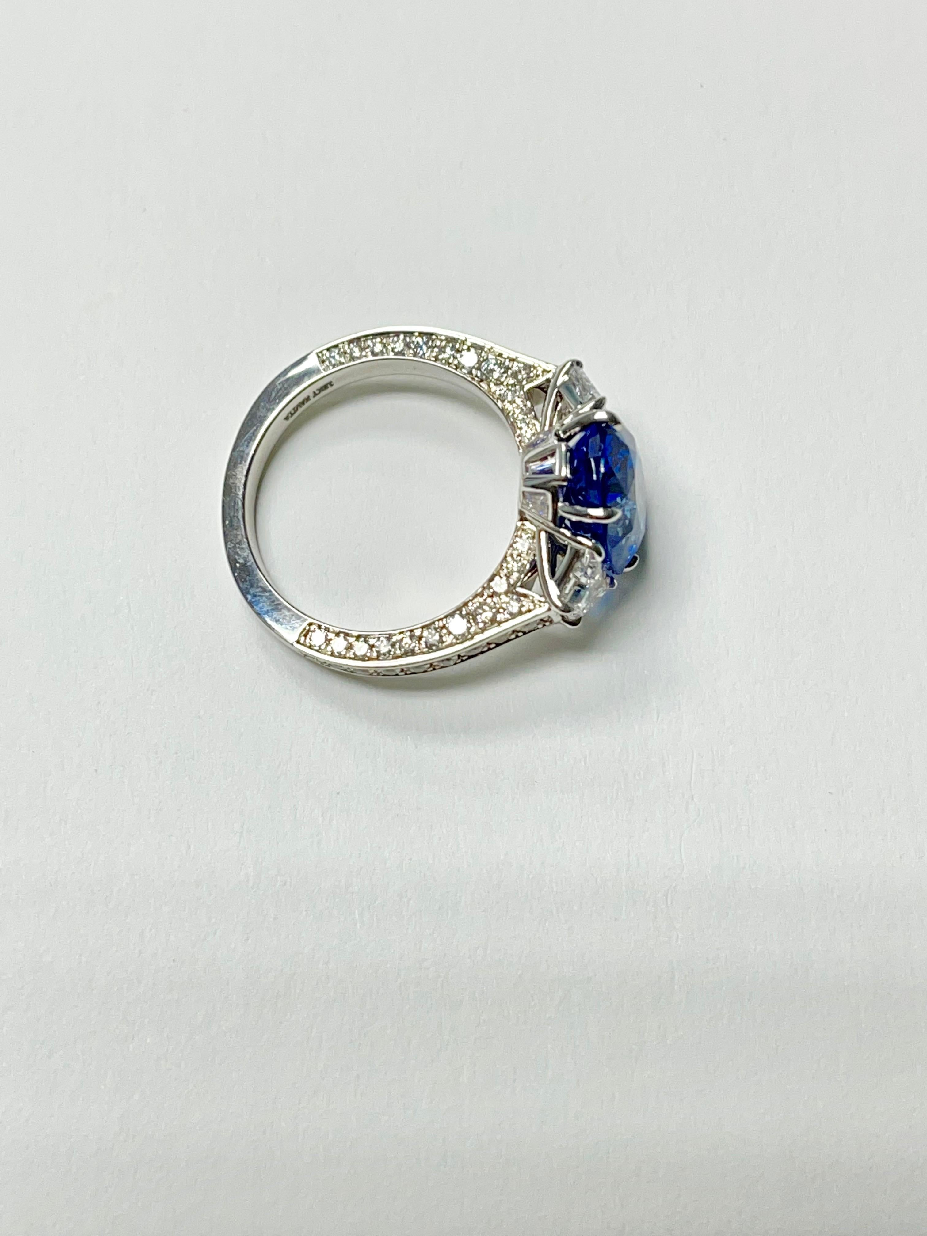 Oval Cut 5.06 Carat Oval Blue Sapphire and Diamond Engagement Ring C.Dunaigre Certified. For Sale