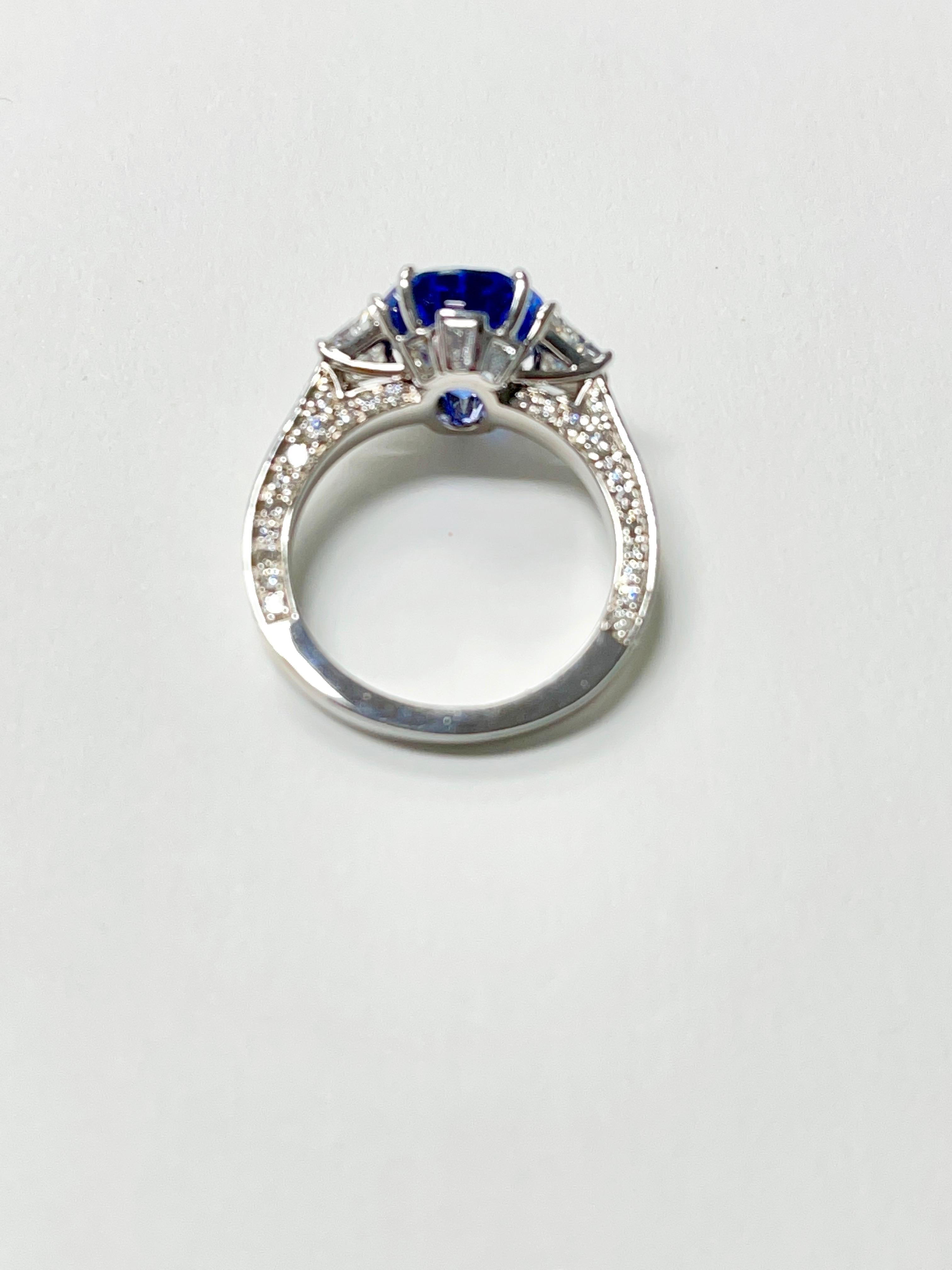 5.06 Carat Oval Blue Sapphire and Diamond Engagement Ring C.Dunaigre Certified. In New Condition For Sale In New York, NY