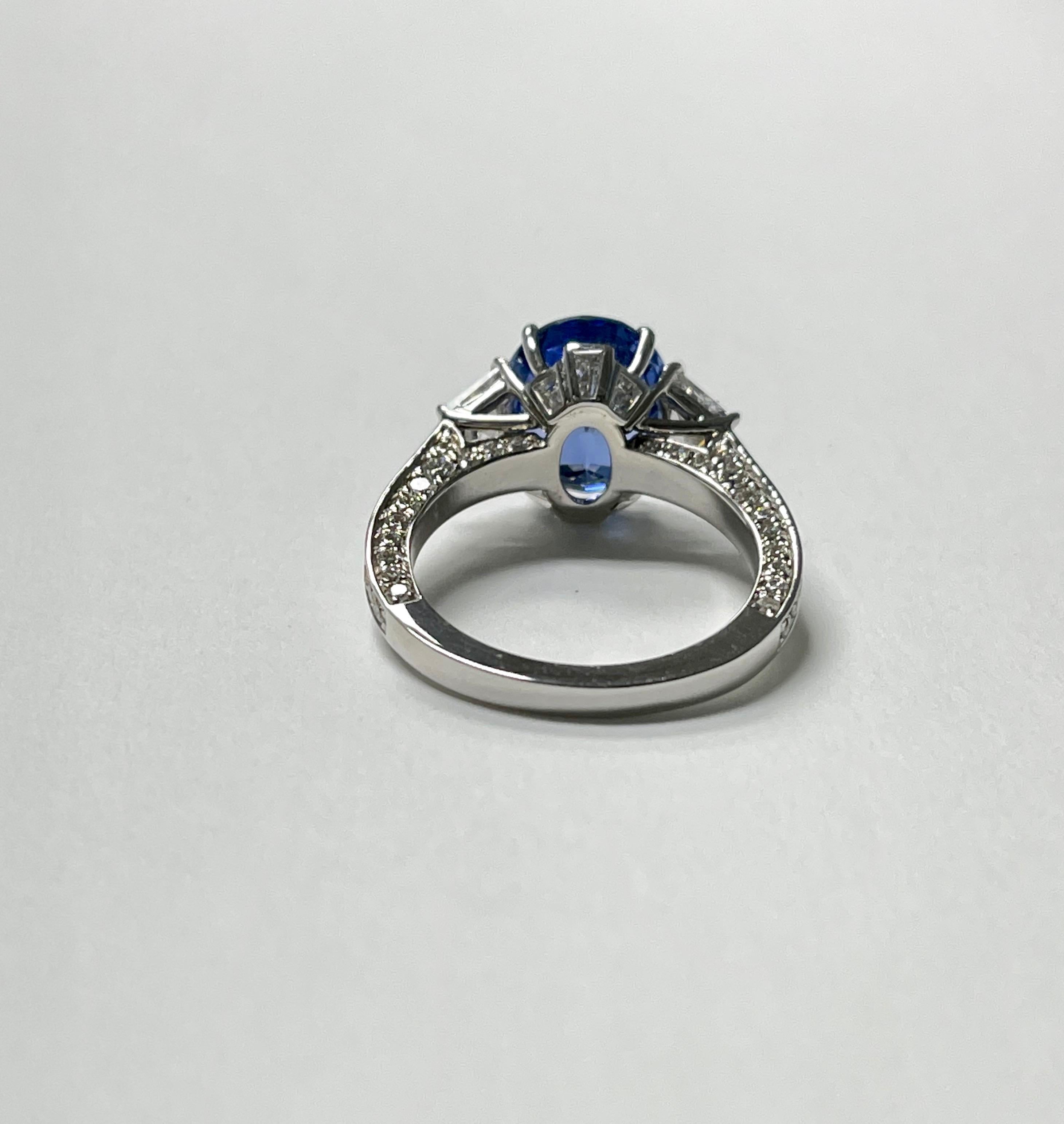 Women's or Men's 5.06 Carat Oval Blue Sapphire and Diamond Engagement Ring C.Dunaigre Certified. For Sale