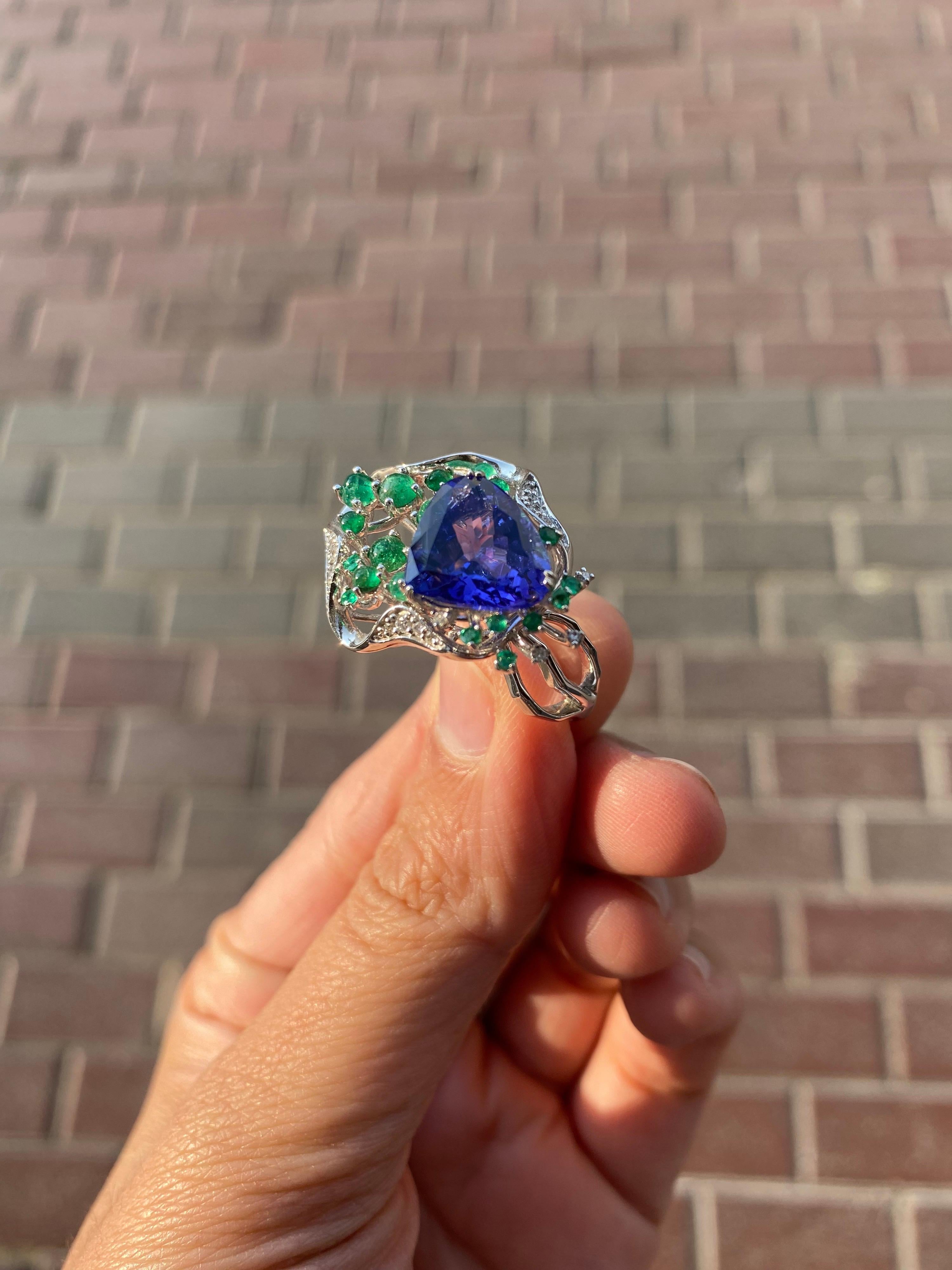 Artist 5.06 Carat Tanzanite, Emerald and Diamond 18k Gold Cocktail Ring For Sale