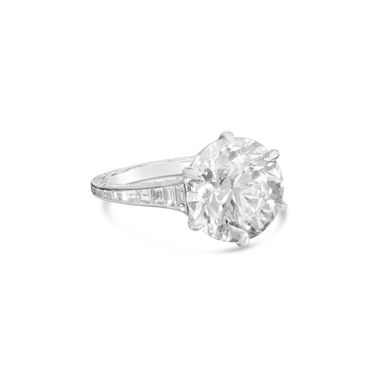 5.07ct G SI1 old European brilliant cut diamond with GIA certificate
Calibre-cut diamonds weighing a combined total of 0.87cts
Platinum with maker's signature
UK finger size K, US size 5.5 - can be ordered in your own finger size
5.2 grams

A