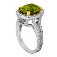 5.07 Carat Oval Peridot Diamond Gold Halo Ring