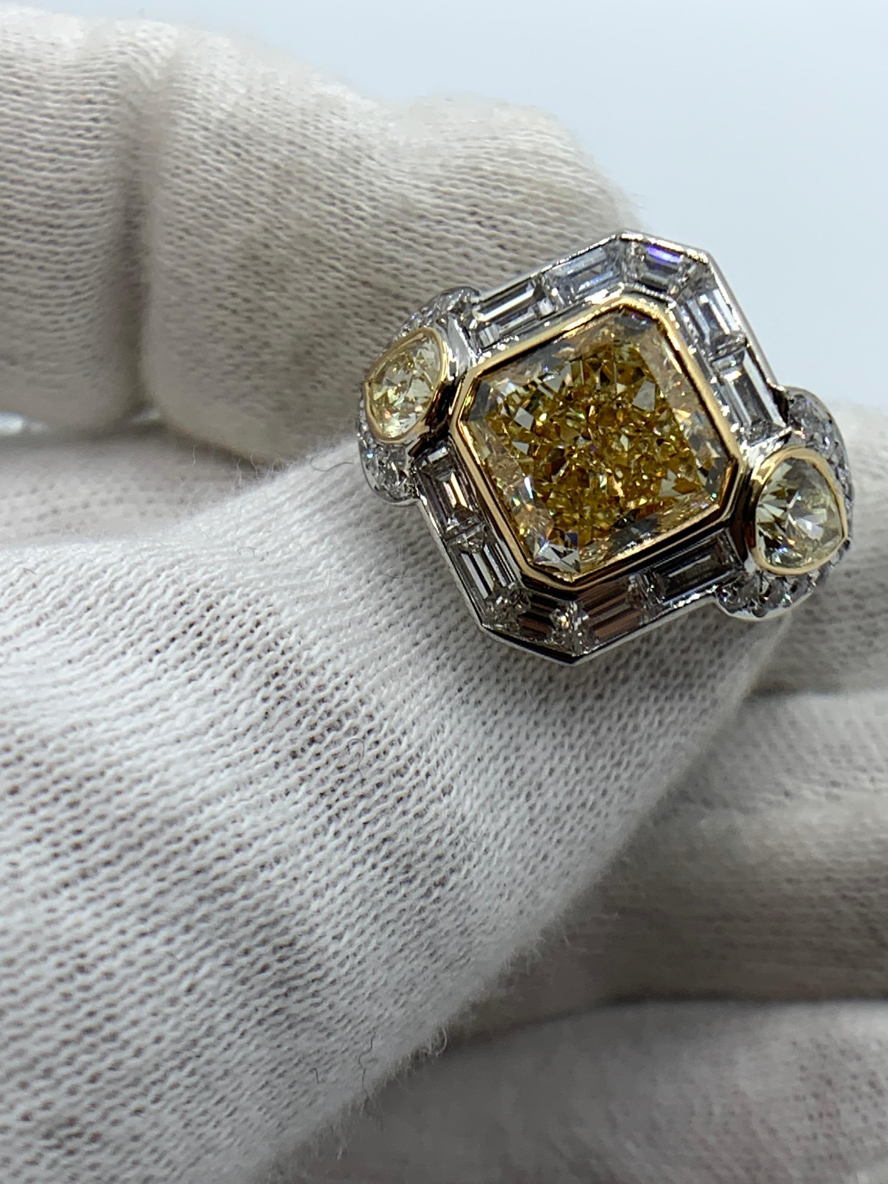 Radiant Cut 5.07 Carat Yellow Diamond and White Diamond Ring